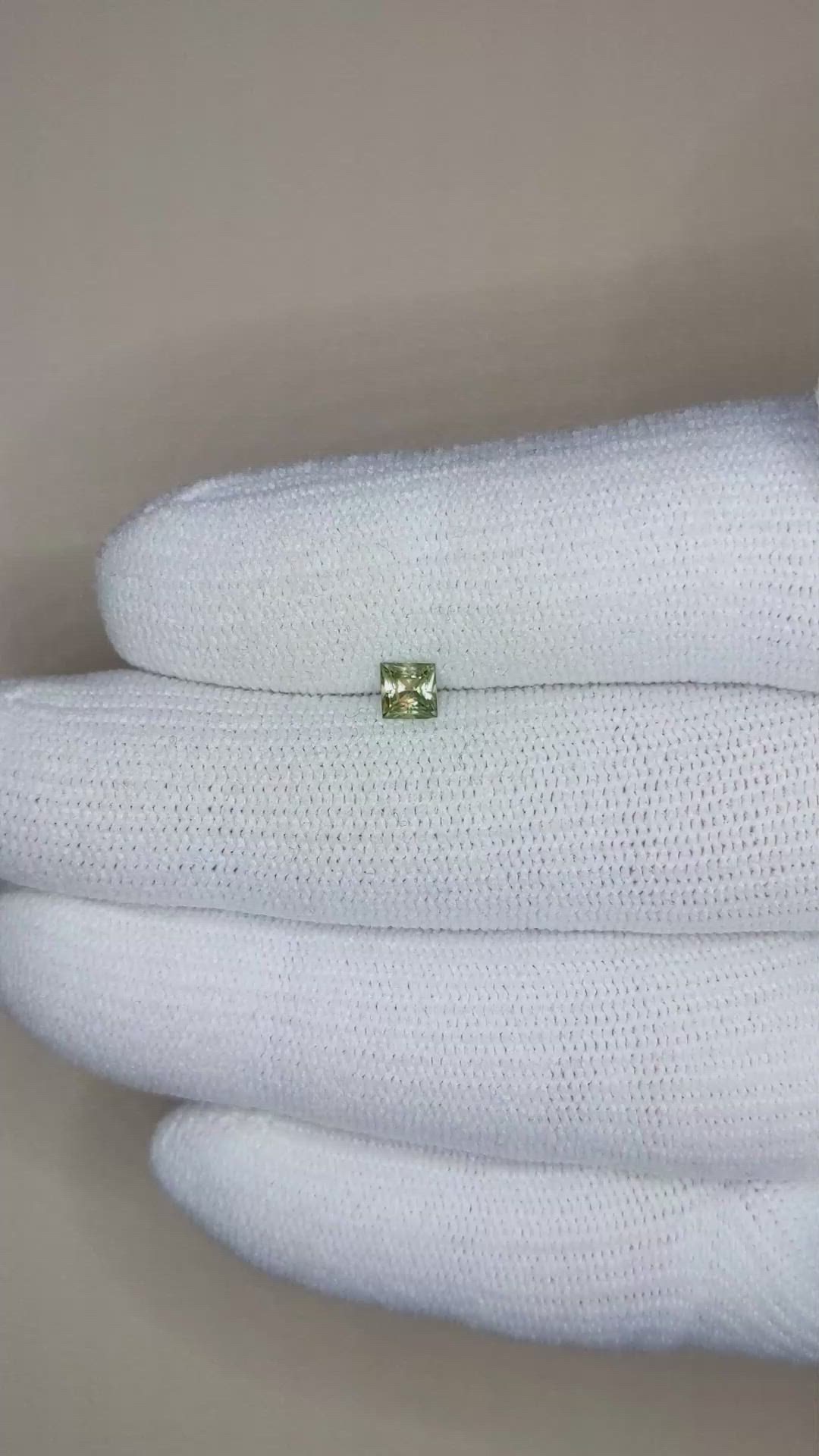 0.39 Ct. Yellowish Green Sapphire from Montana Size Video