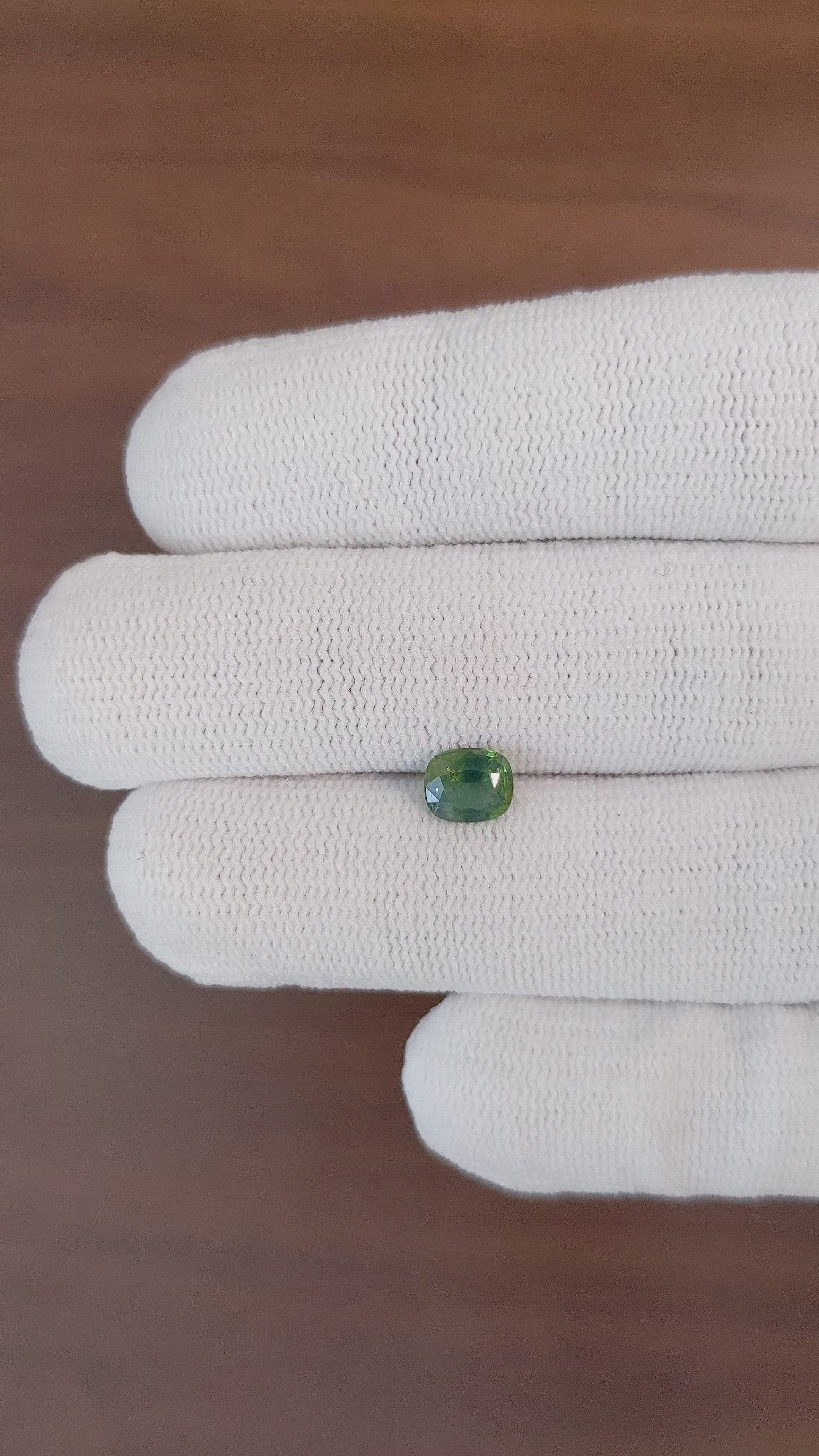 0.99 Ct. Yellowish Green Sapphire from Africa Size Video