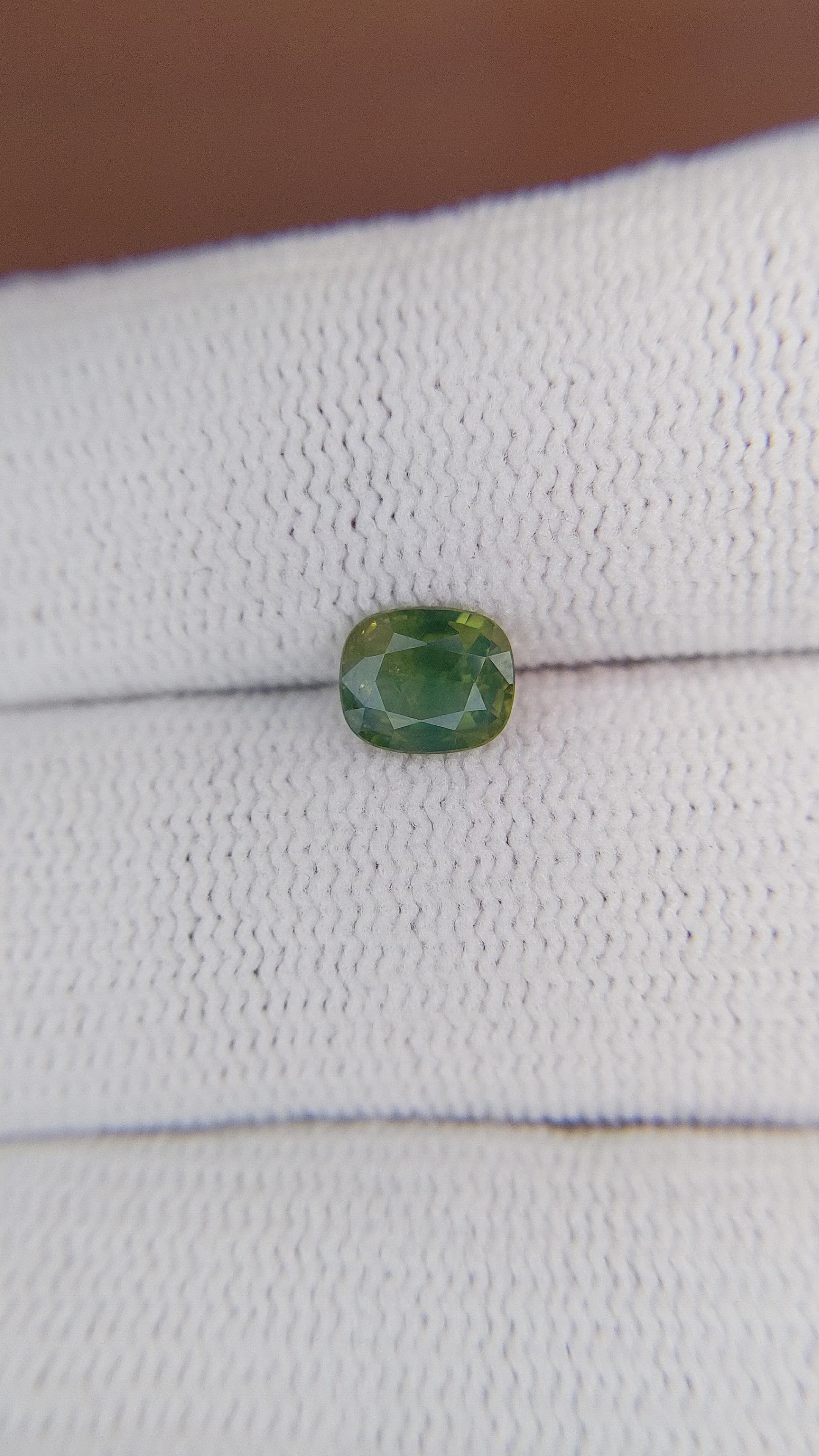 0.99 Ct. Yellowish Green Sapphire from Africa Size Video