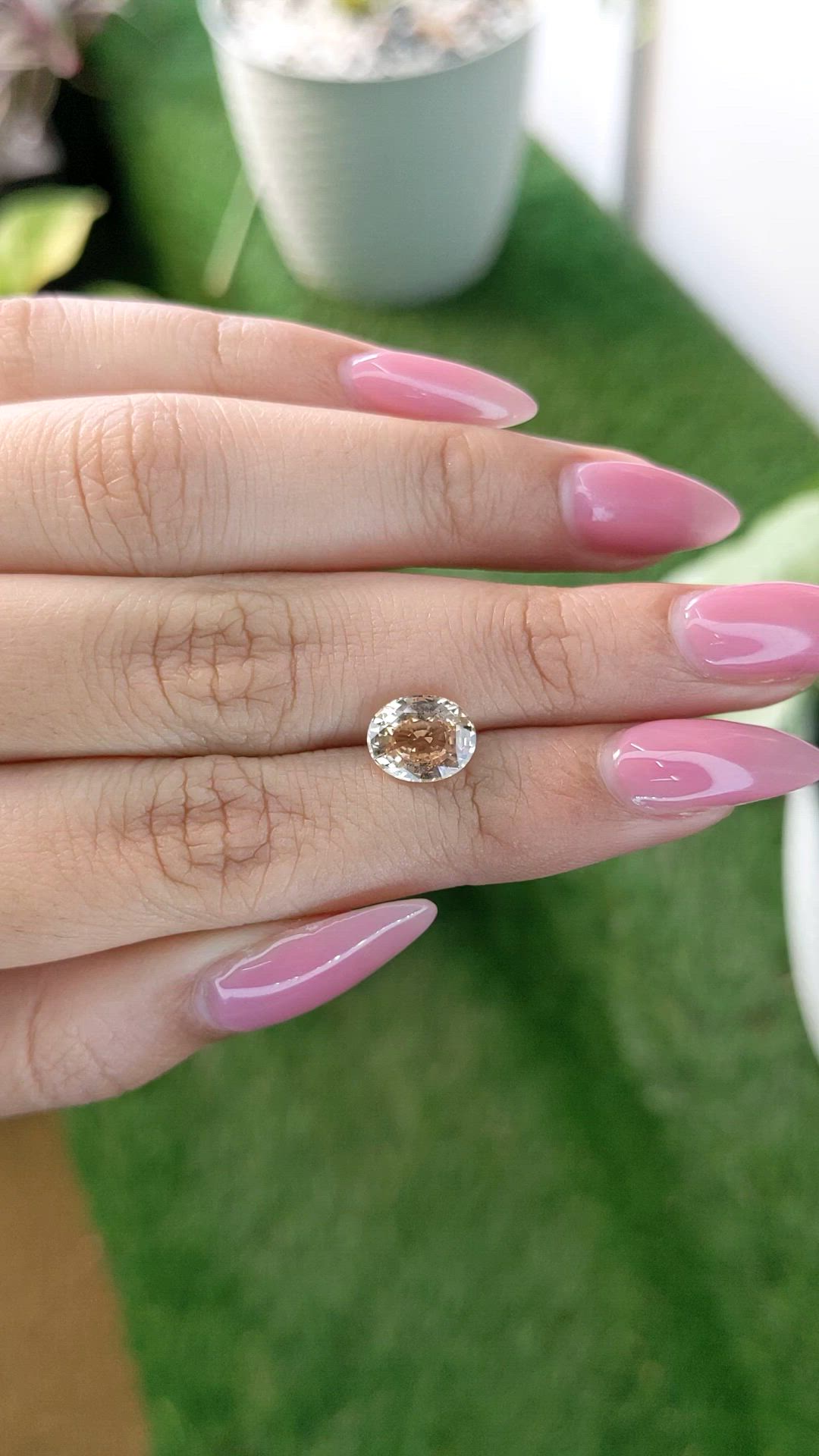2.30 Ct. Peach Sapphire from Ceylon (Sri Lanka) Size Video