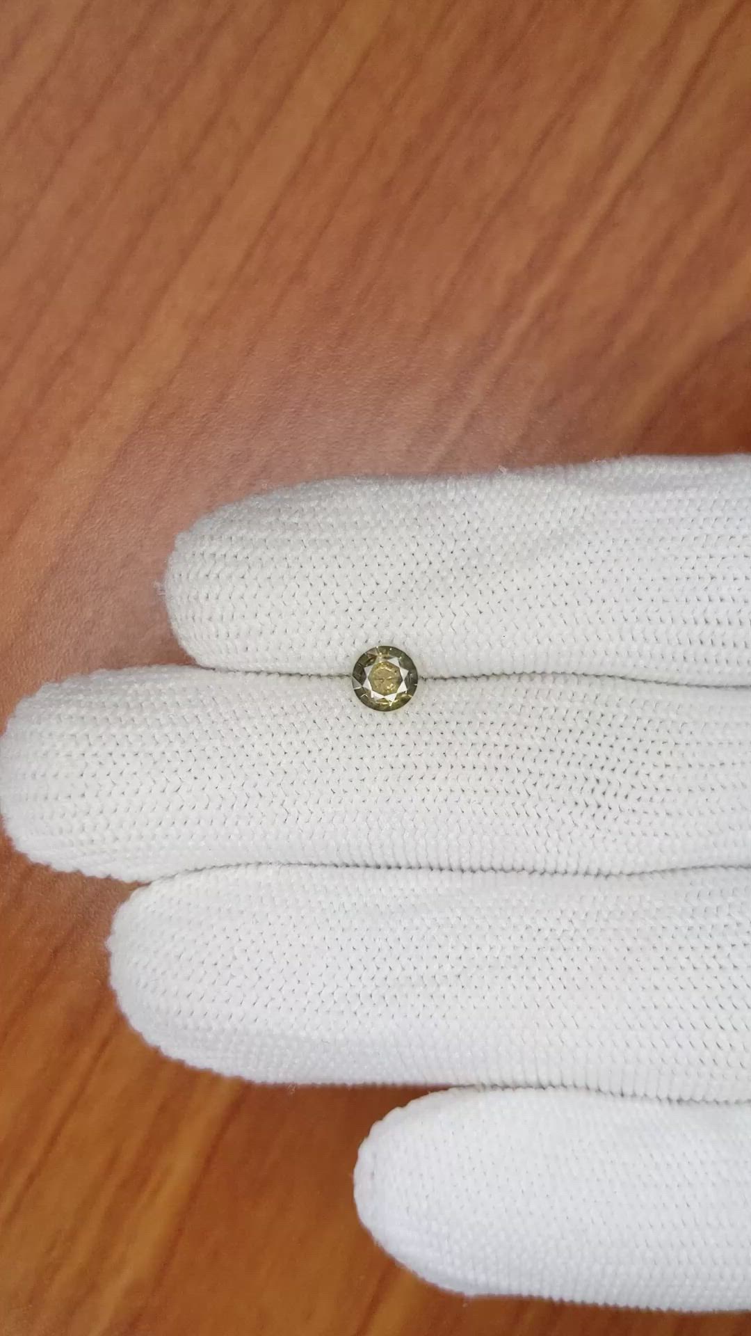 0.48 Ct. Greenish Yellow Sapphire from Ceylon (Sri Lanka) Size Video