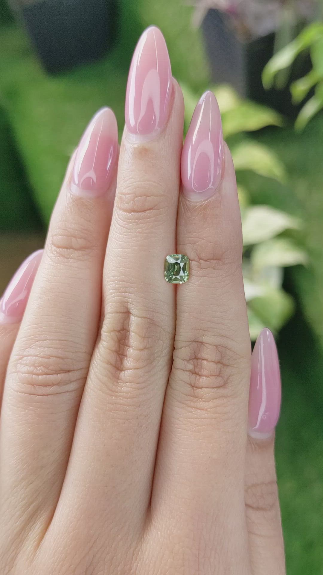 0.81 Ct. Yellowish Green Sapphire from Madagascar Size Video