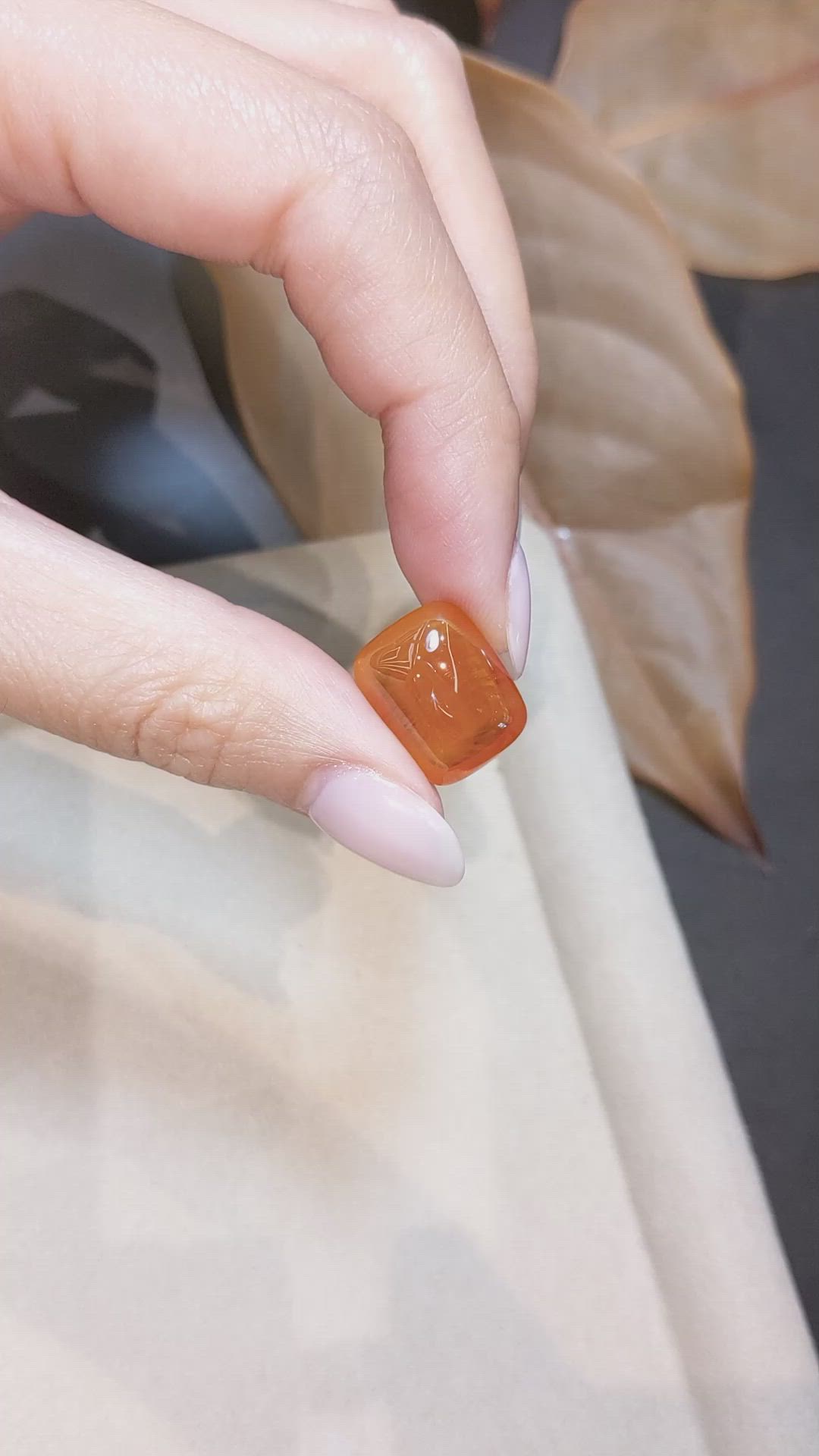 16.35 Ct. Orange Cabochon Sapphire from Ceylon (Sri Lanka) Size Video