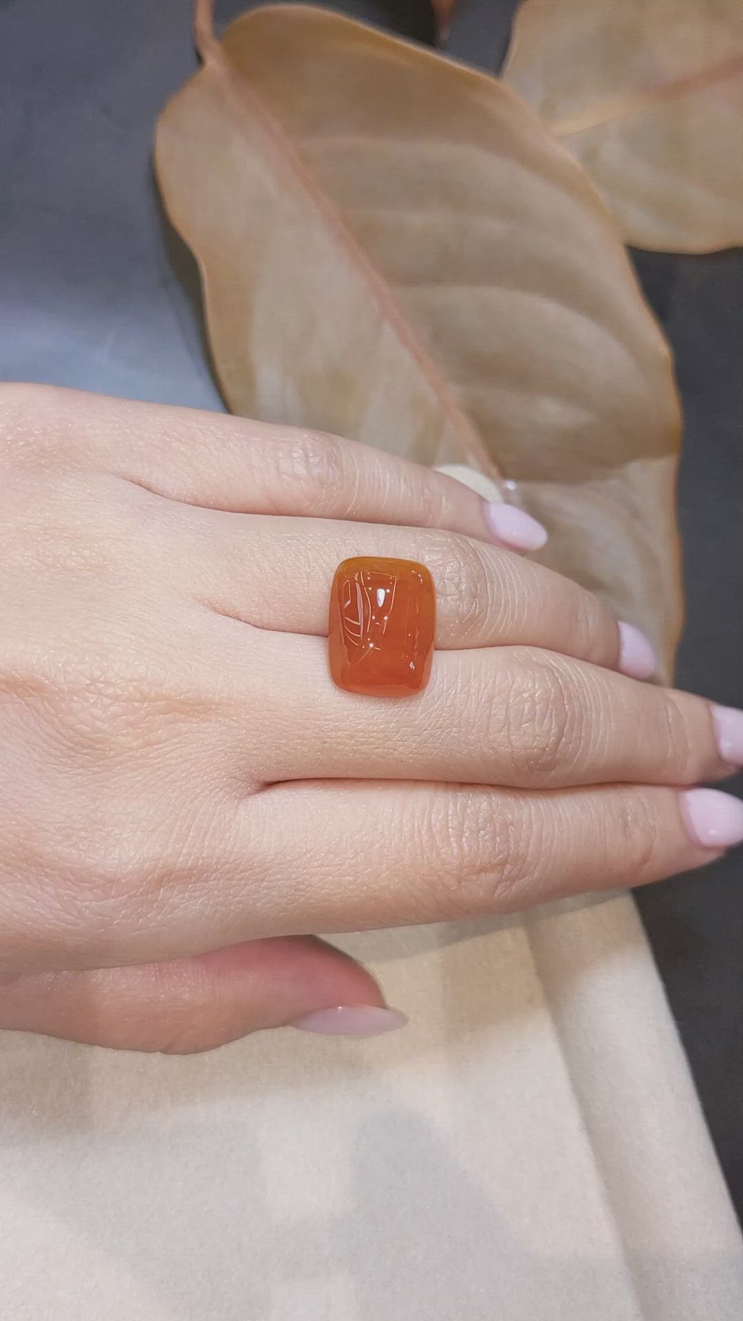16.35 Ct. Orange Cabochon Sapphire from Ceylon (Sri Lanka) Size Video