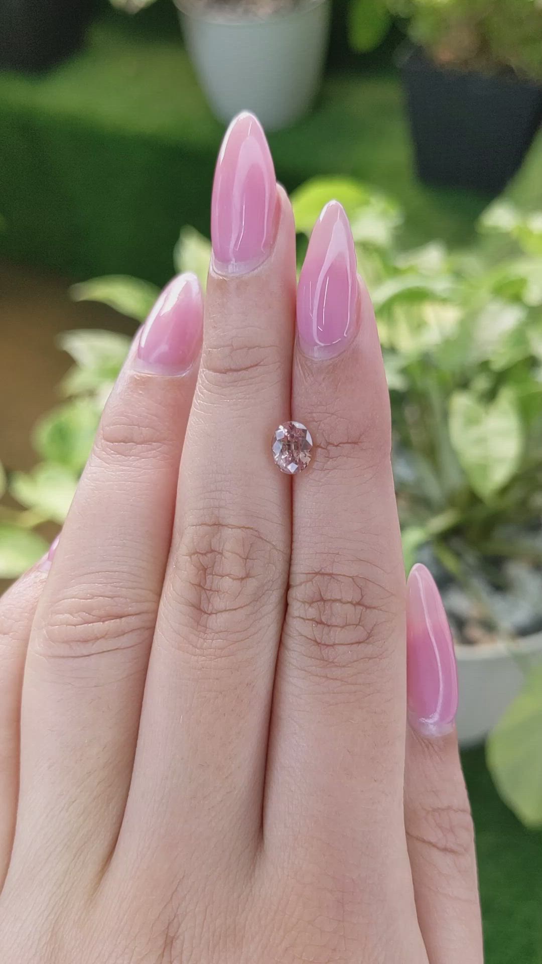 1.65 Ct. Peach Sapphire from Ceylon (Sri Lanka) Size Video