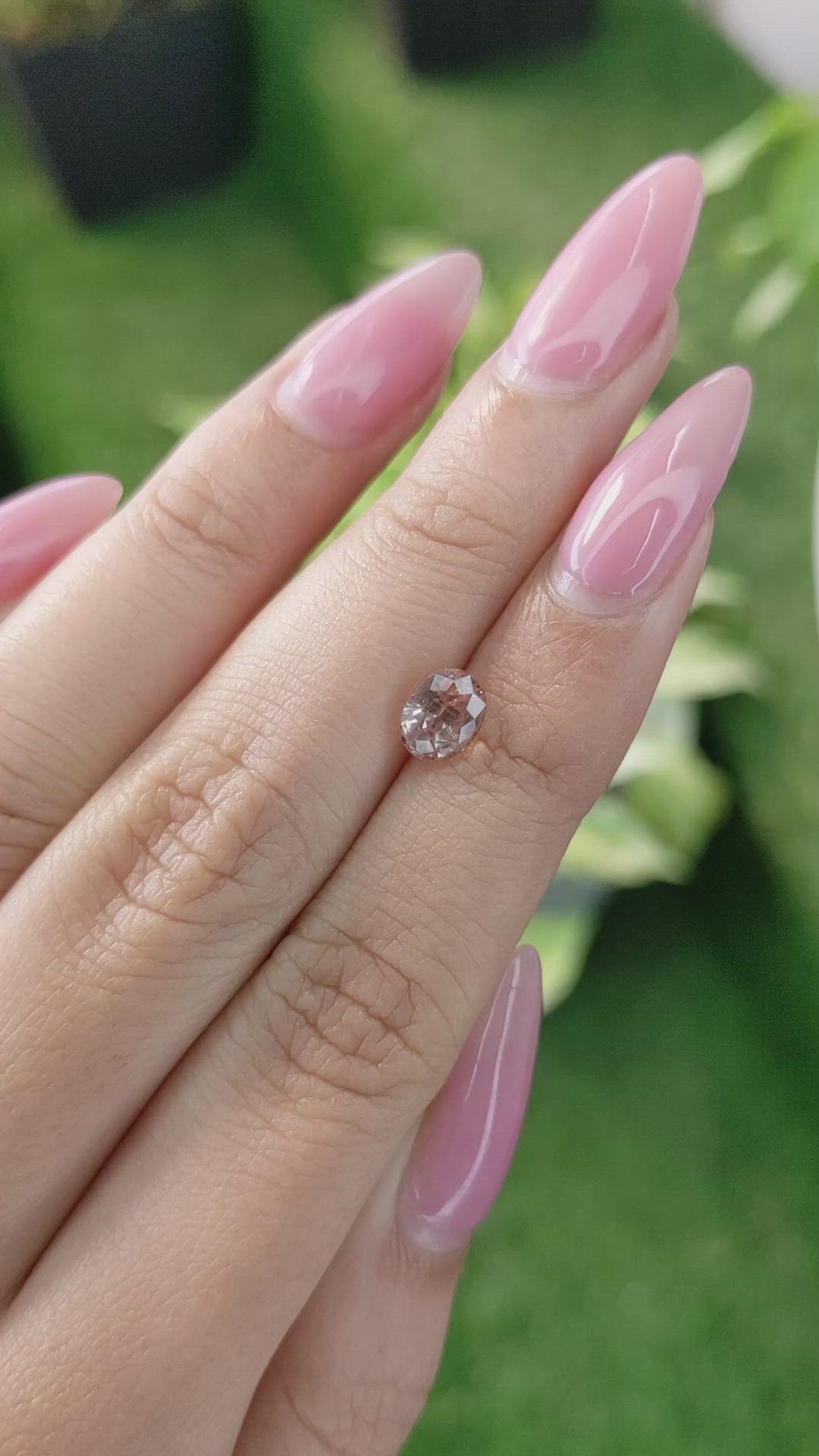1.65 Ct. Peach Sapphire from Ceylon (Sri Lanka) Size Video