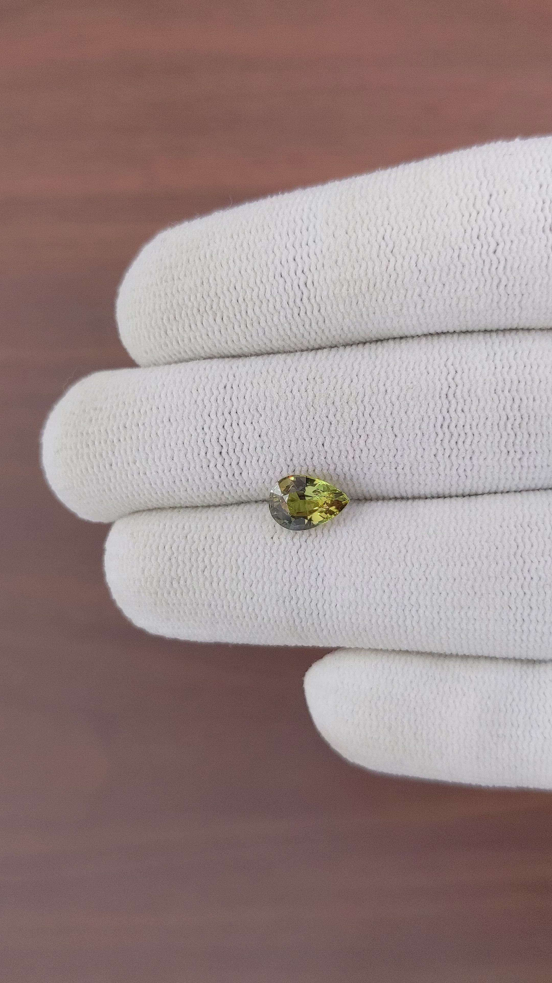 1.56 Ct. Yellowish Green Sapphire from Ceylon (Sri Lanka) Size Video