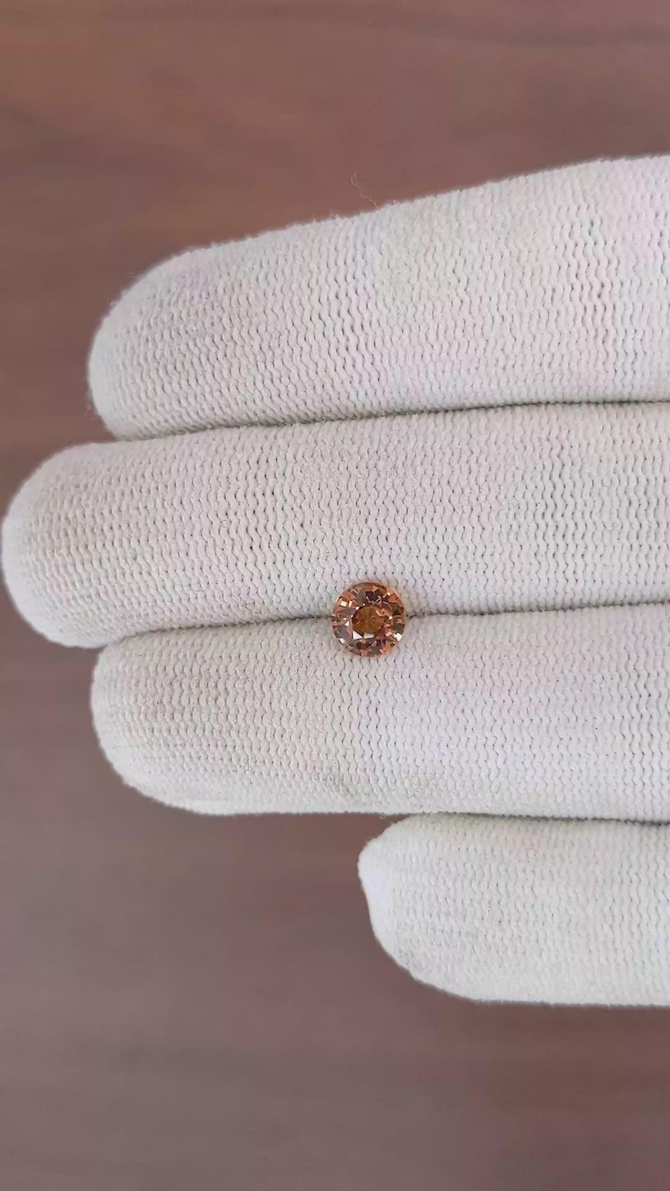 1.04 Ct. Orangish Brown Sapphire from Madagascar Size Video