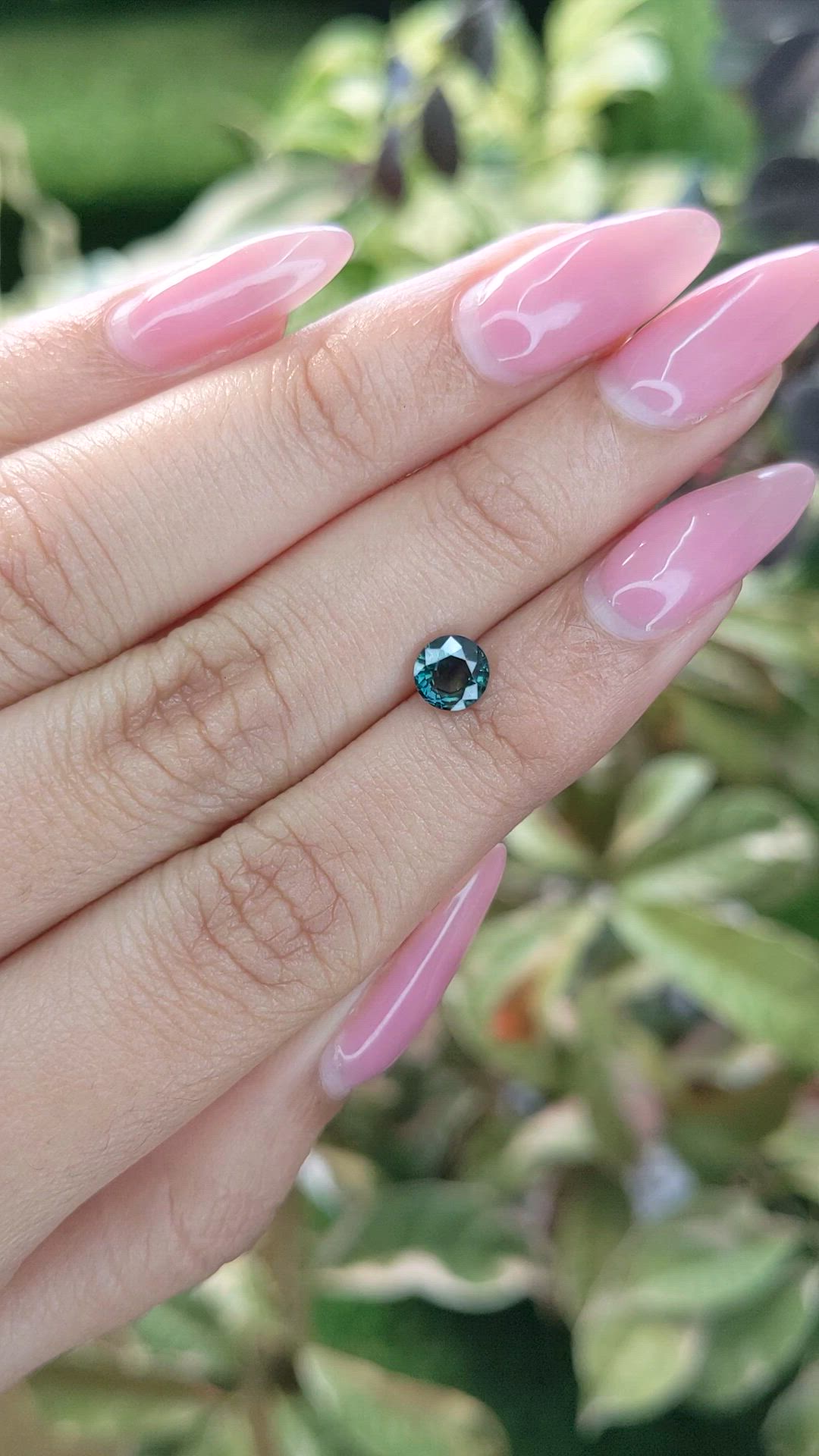 0.82 Ct. Bluish Green Sapphire from Madagascar Size Video