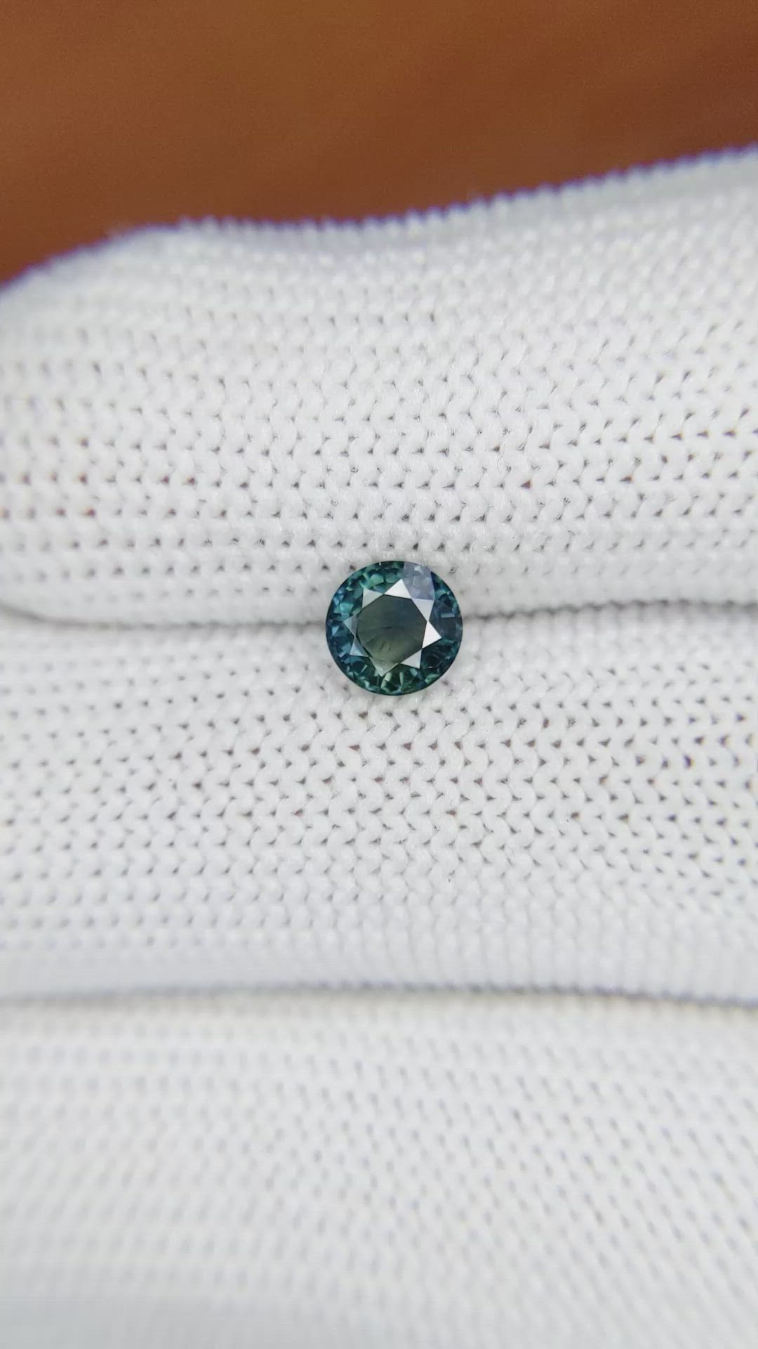 0.82 Ct. Bluish Green Sapphire from Madagascar Size Video