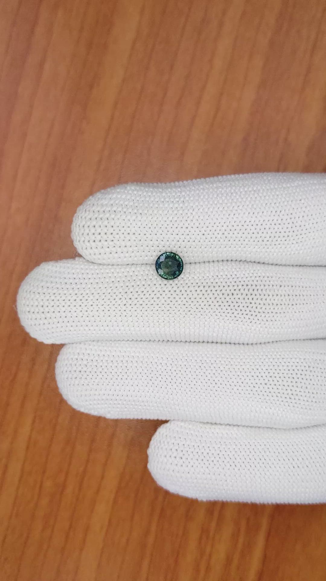 0.82 Ct. Bluish Green Sapphire from Madagascar Size Video
