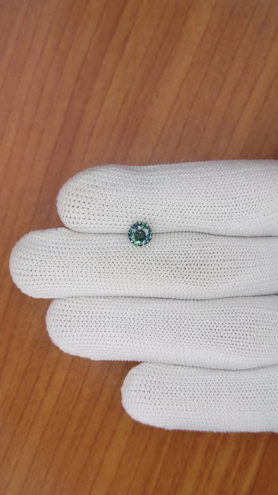 0.72 Ct. Bluish Green Sapphire from Madagascar Size Video