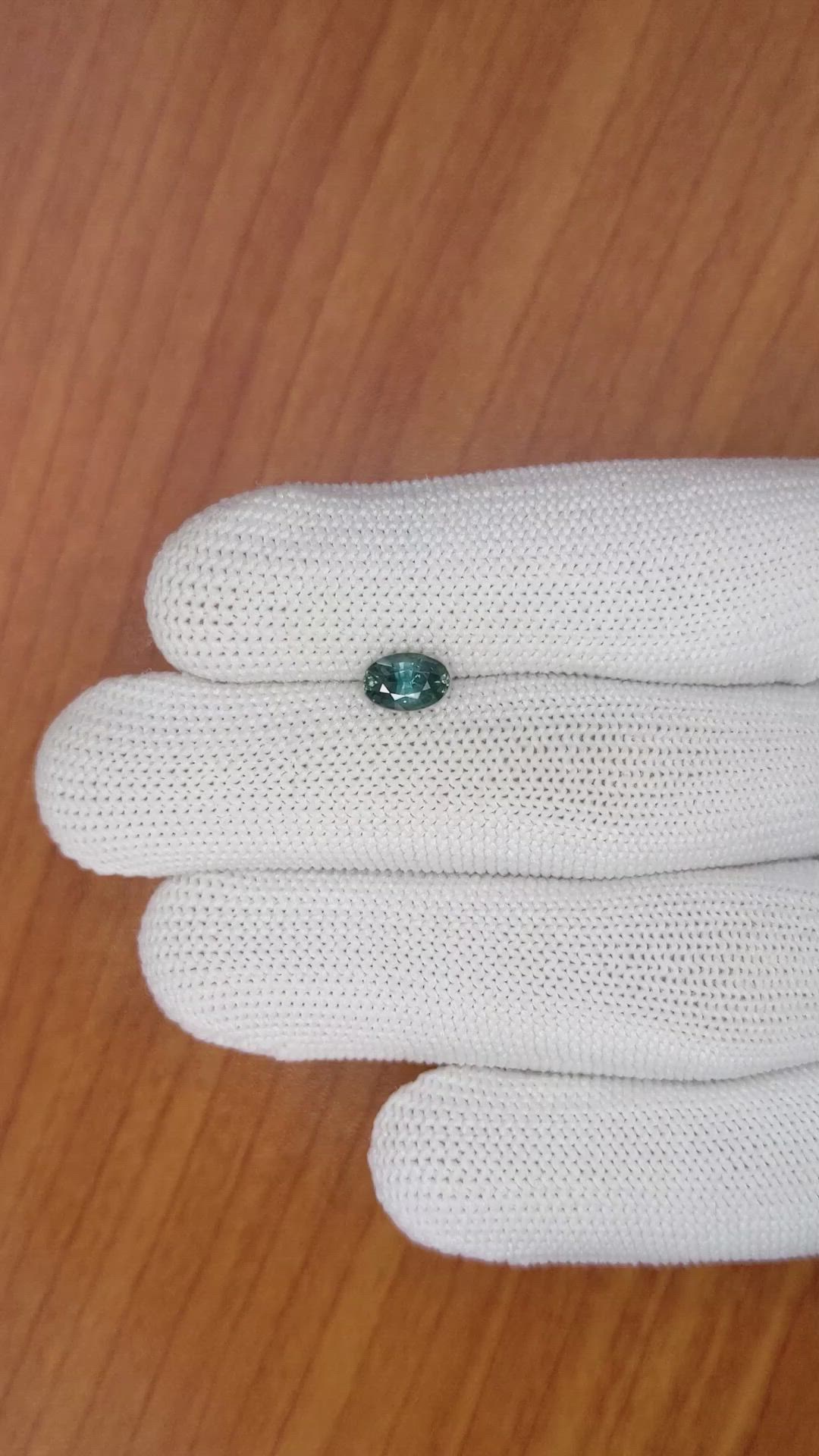 0.99 Ct. Bluish Green Sapphire from Madagascar Size Video