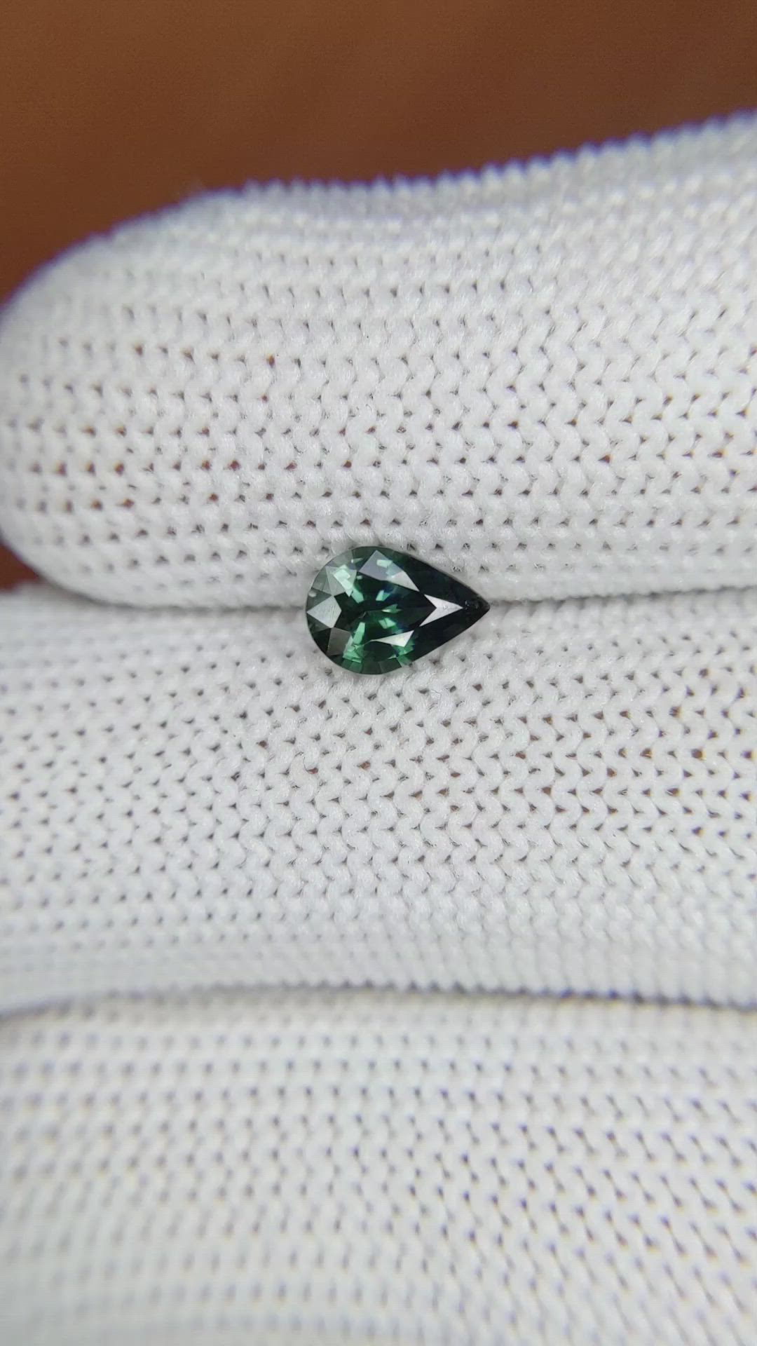 0.76 Ct. Bluish Green Sapphire from Madagascar Size Video