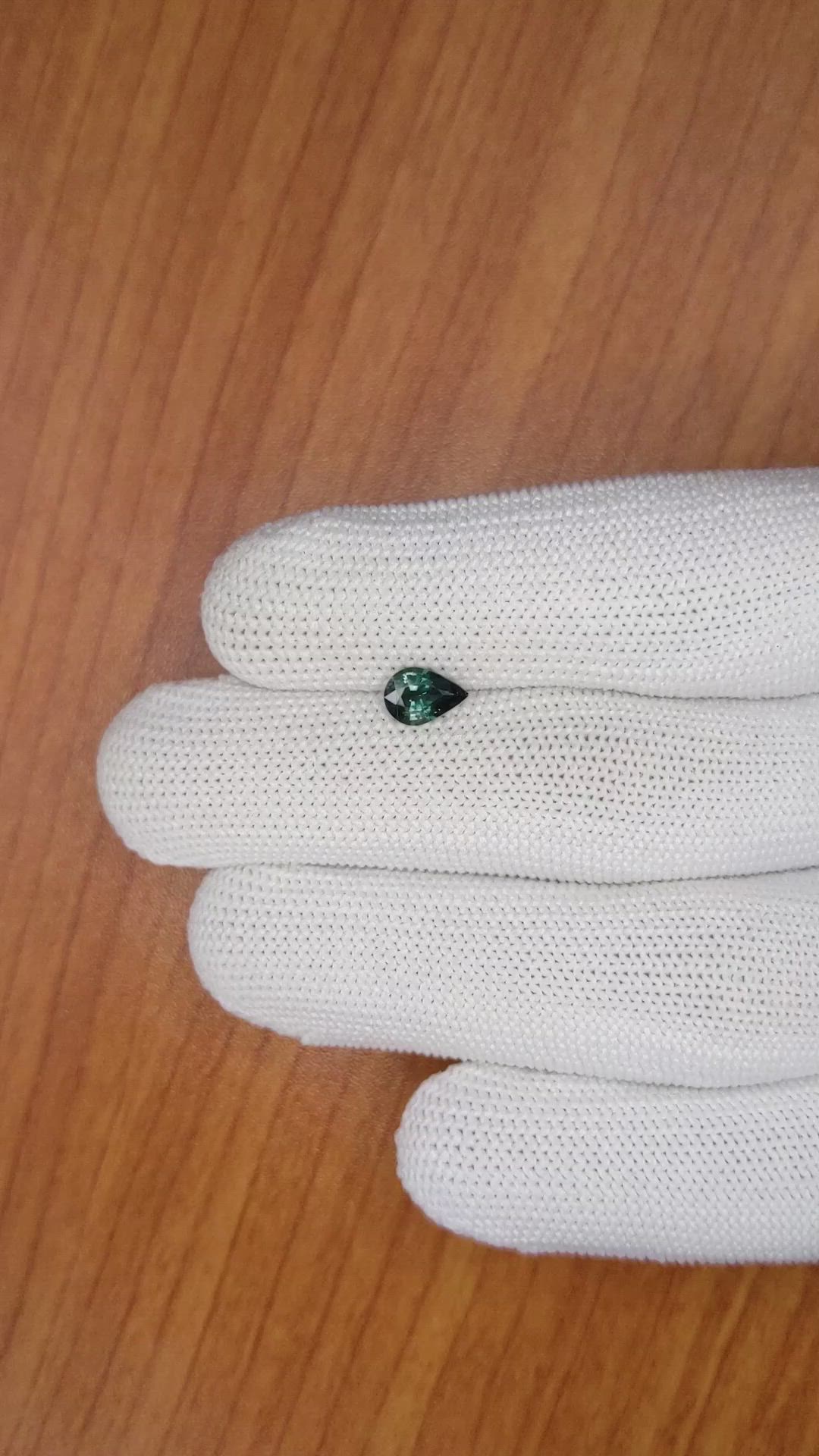 0.76 Ct. Bluish Green Sapphire from Madagascar Size Video