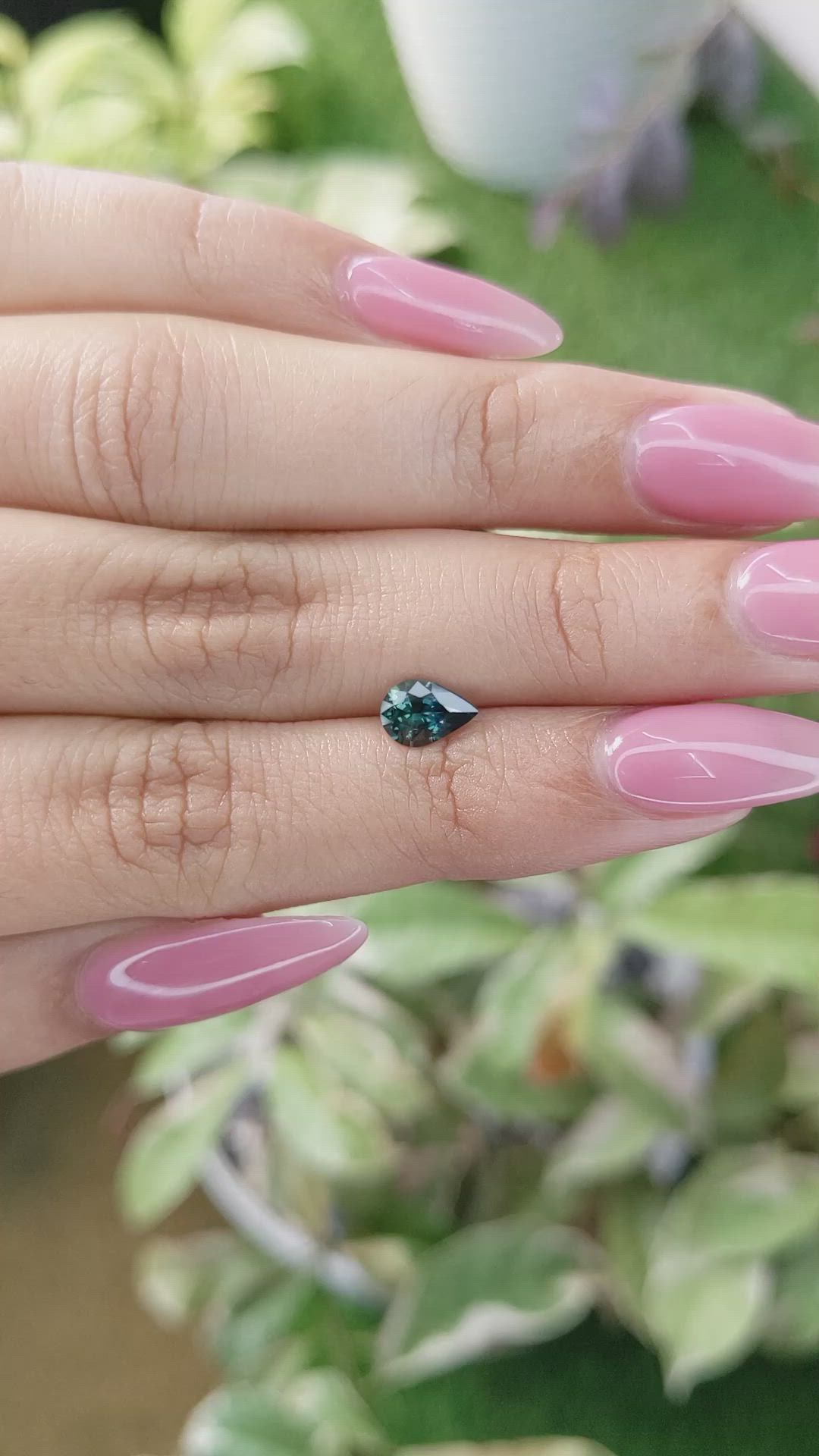 0.76 Ct. Bluish Green Sapphire from Madagascar Size Video