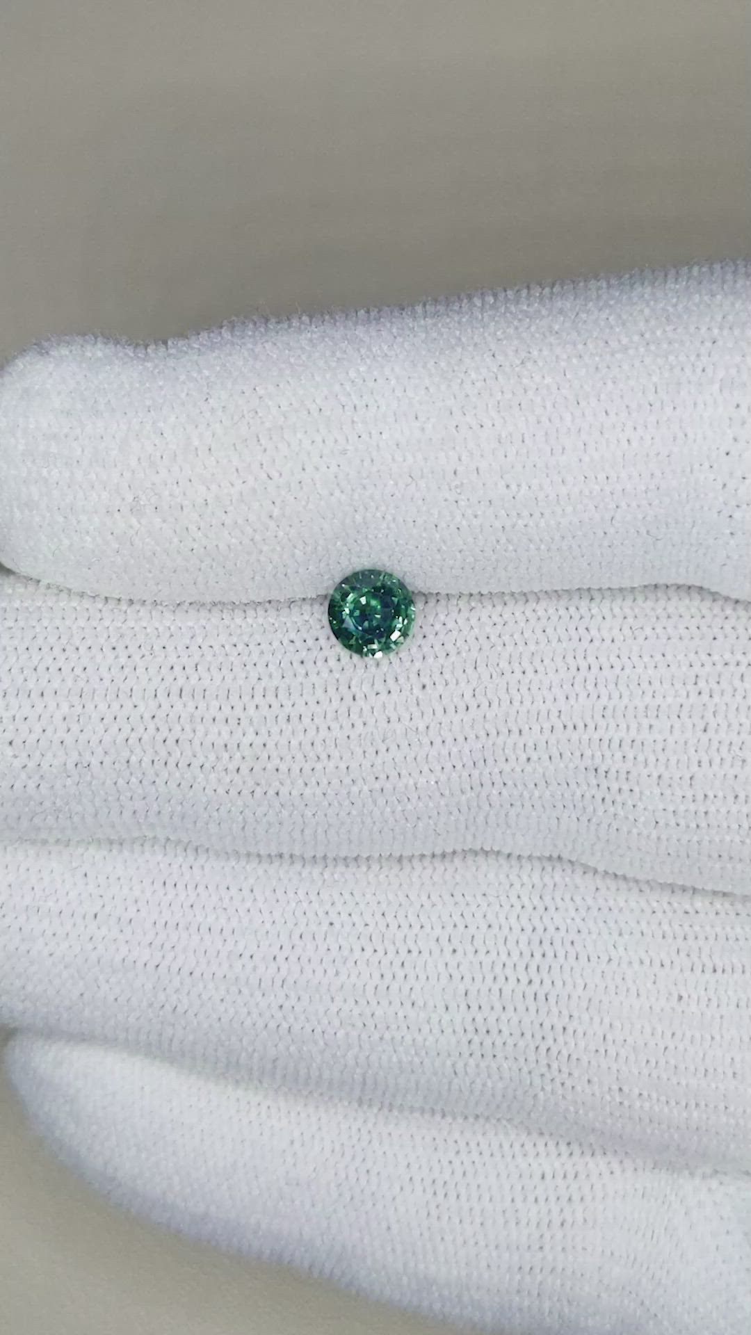0.57 Ct. Bluish Green Sapphire from Thailand Size Video