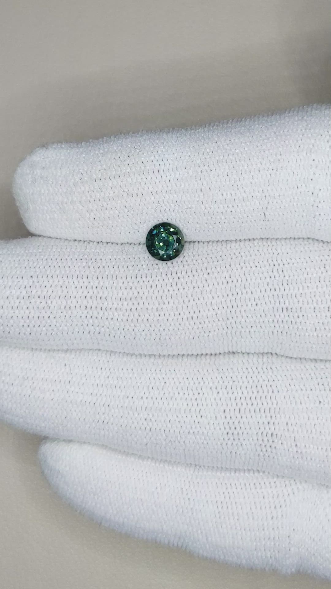0.78 Ct. Bluish Green Sapphire from Thailand Size Video