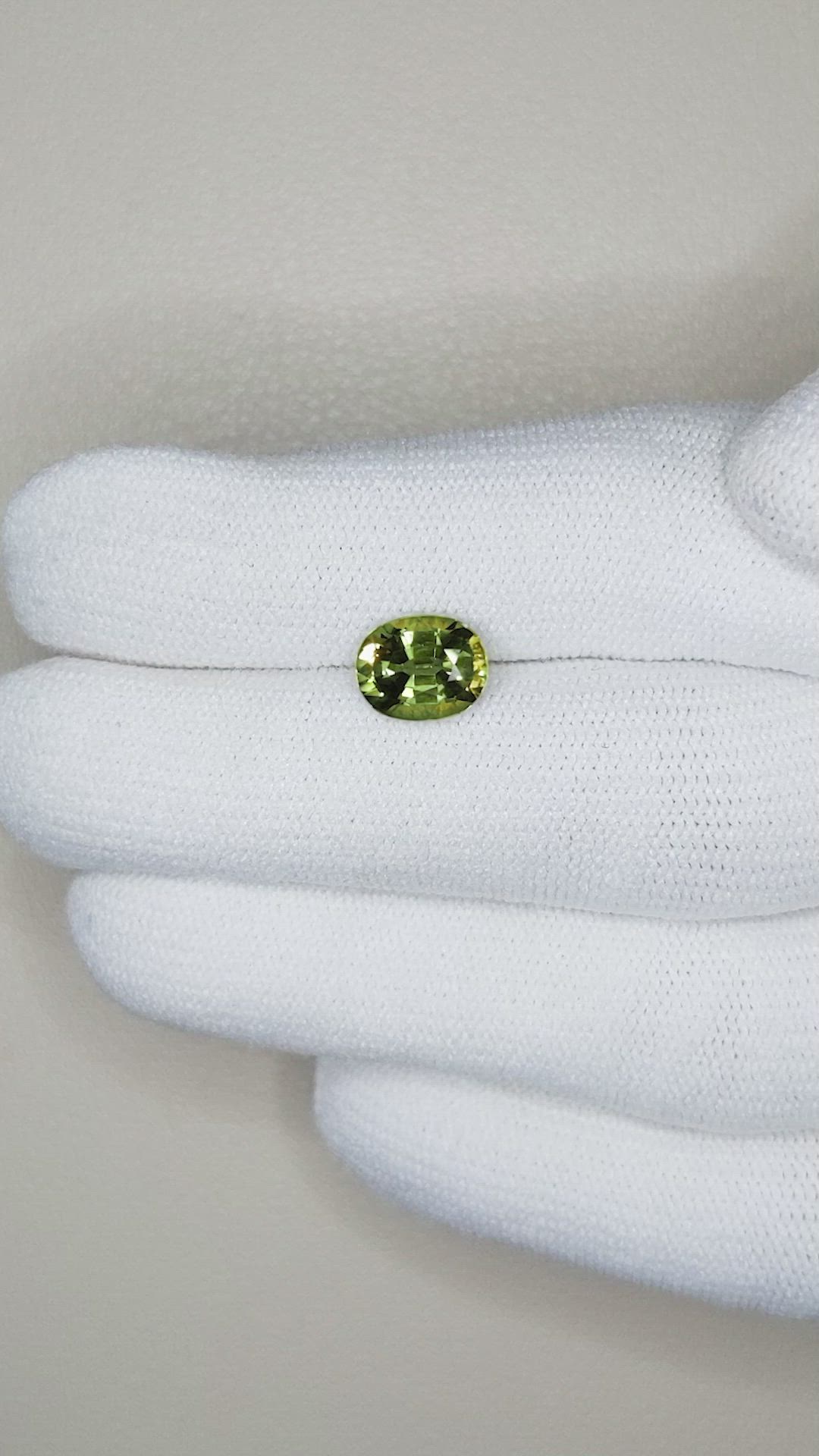 1.90 Ct. Yellowish Green Sapphire from Thailand Size Video