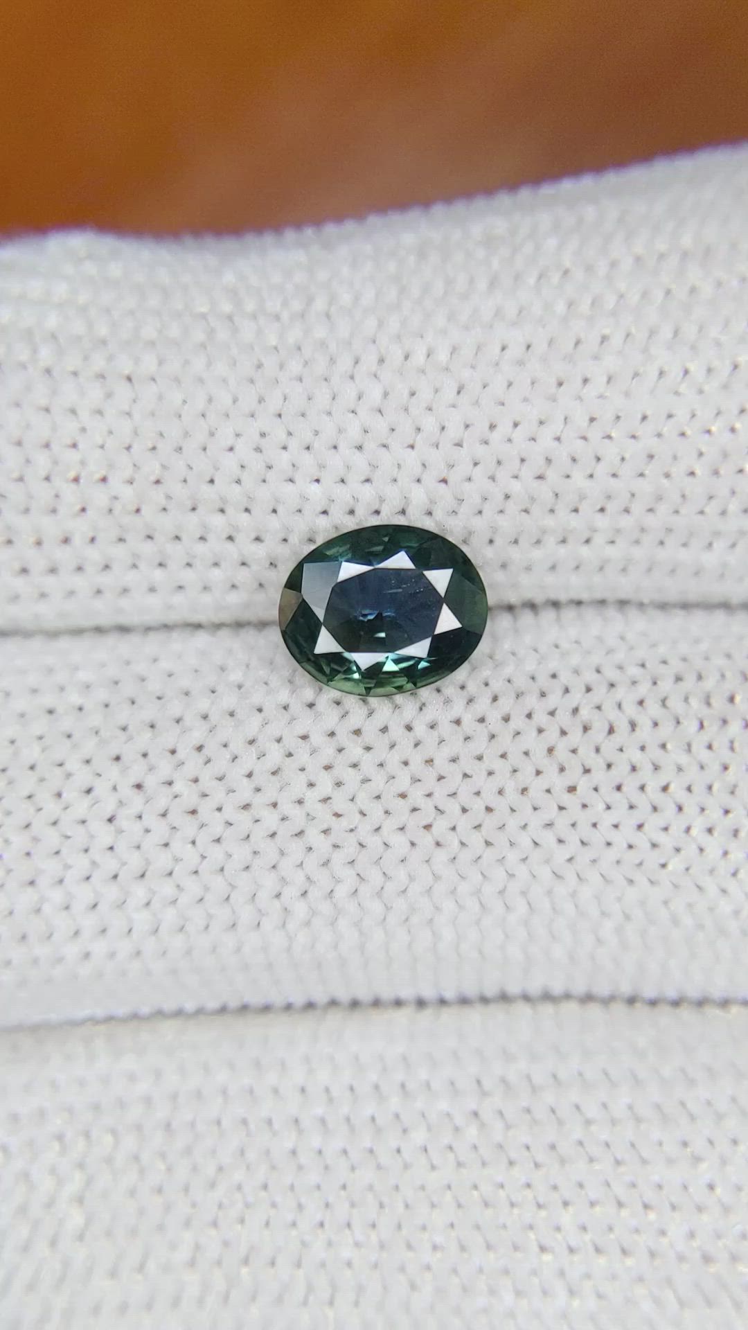 1.58 Ct. Bluish Green Sapphire from Madagascar Size Video
