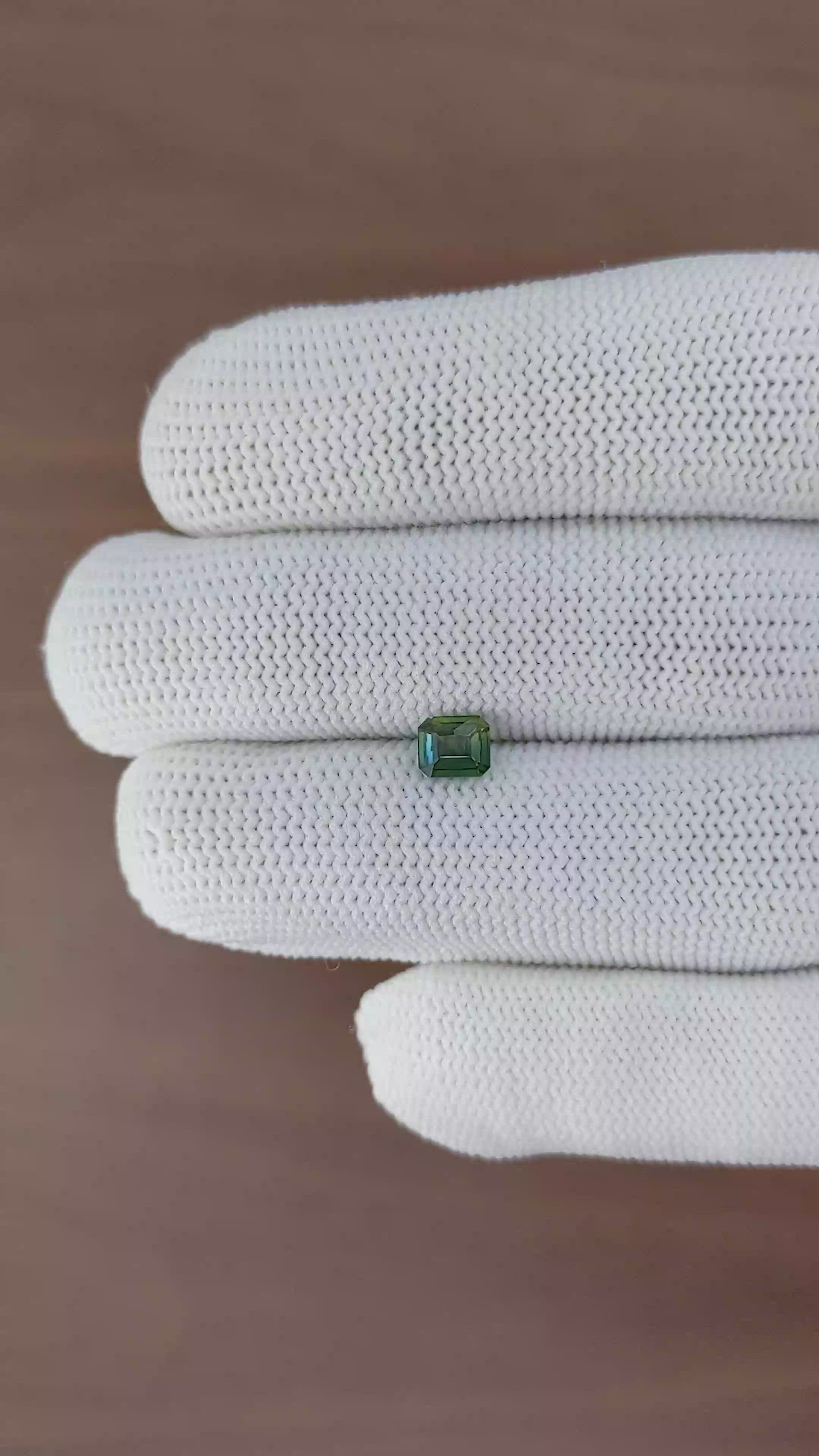 0.56 Ct. Bluish Green Sapphire from Tanzania Size Video