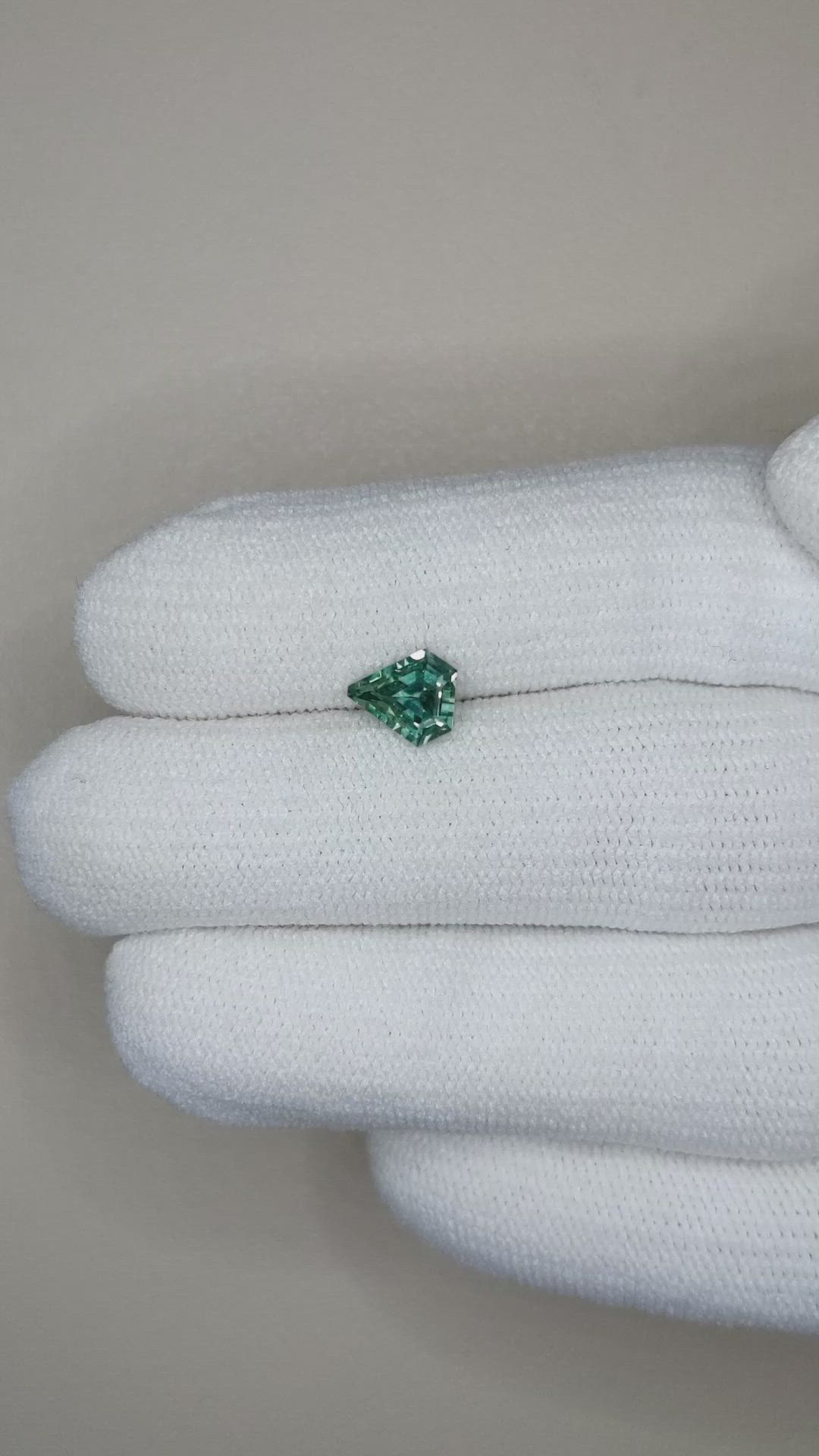 0.87 Ct. Bluish Green Sapphire from Montana Size Video