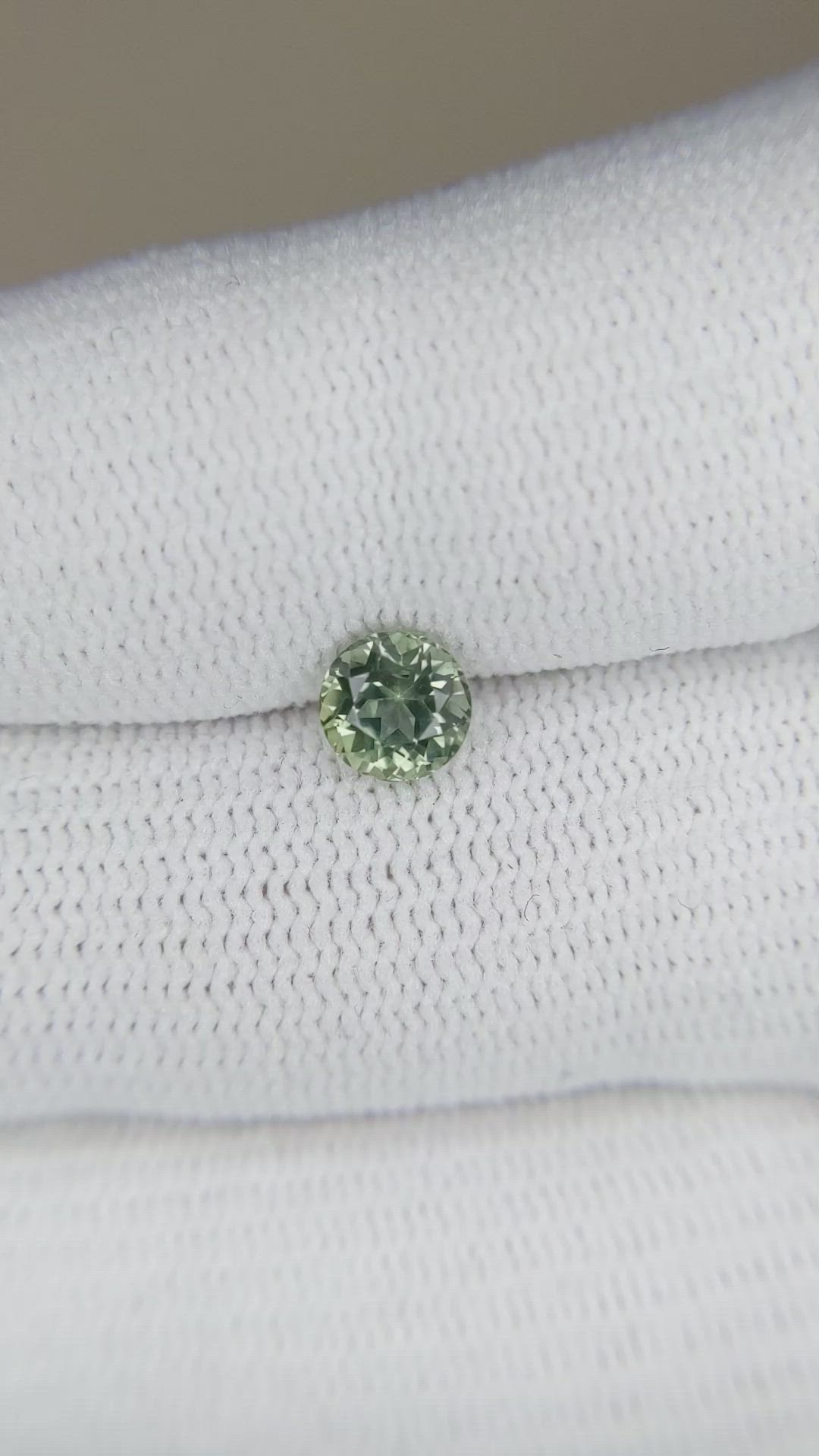 0.92 Ct. Yellowish Green Sapphire from Montana Size Video