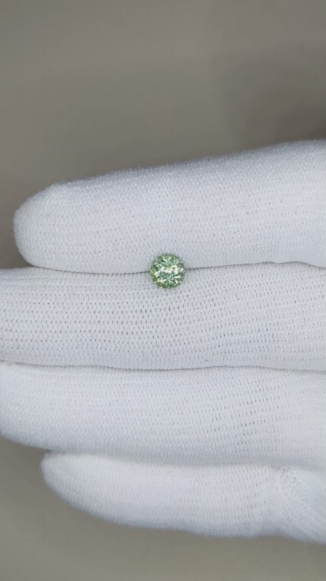 0.92 Ct. Yellowish Green Sapphire from Montana Size Video