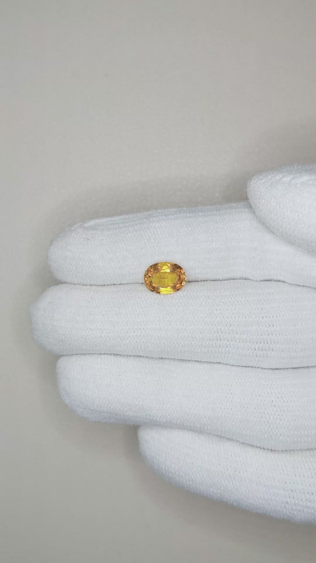1.49 Ct. Orangish Yellow Sapphire from Ceylon (Sri Lanka) Size Video