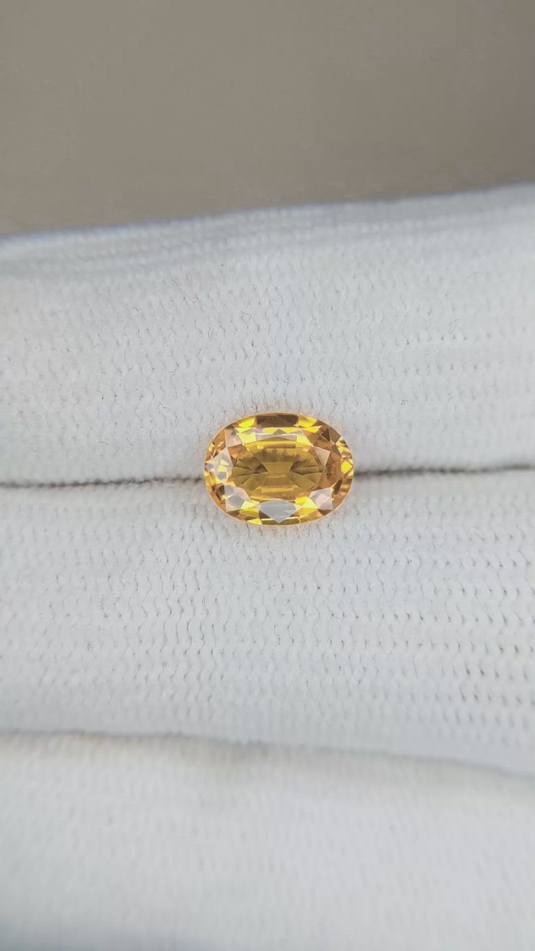 1.49 Ct. Orangish Yellow Sapphire from Ceylon (Sri Lanka) Size Video