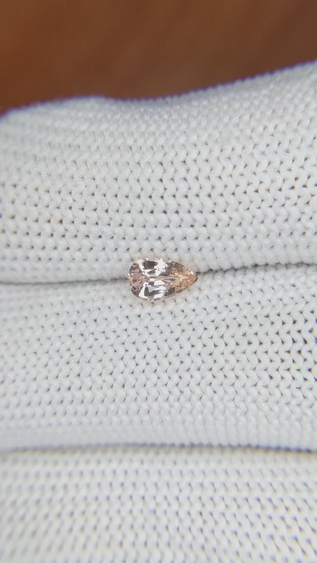 0.57 Ct. Peach Sapphire from Ceylon (Sri Lanka) Size Video