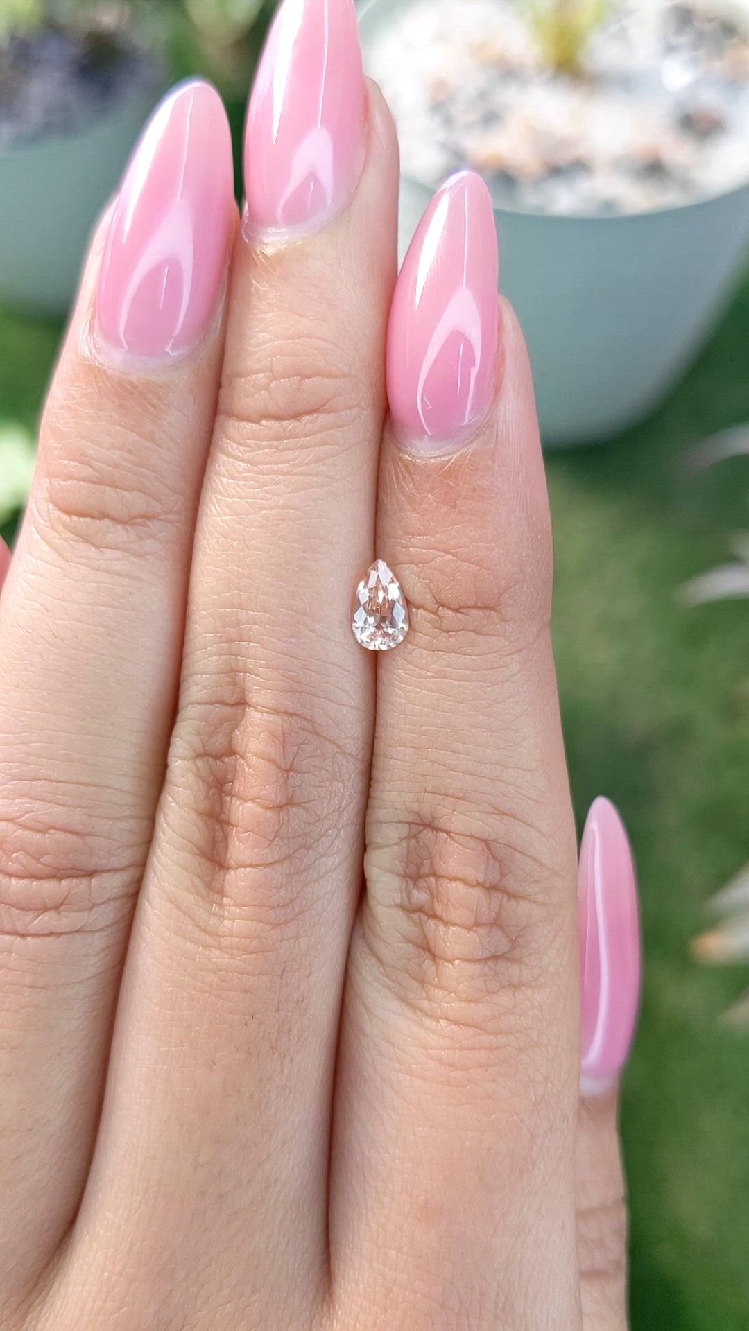 0.57 Ct. Peach Sapphire from Ceylon (Sri Lanka) Size Video