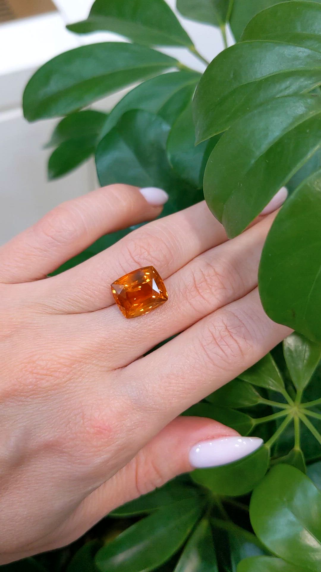 10.69 Ct. Orange Sapphire from Ceylon (Sri Lanka) Size Video