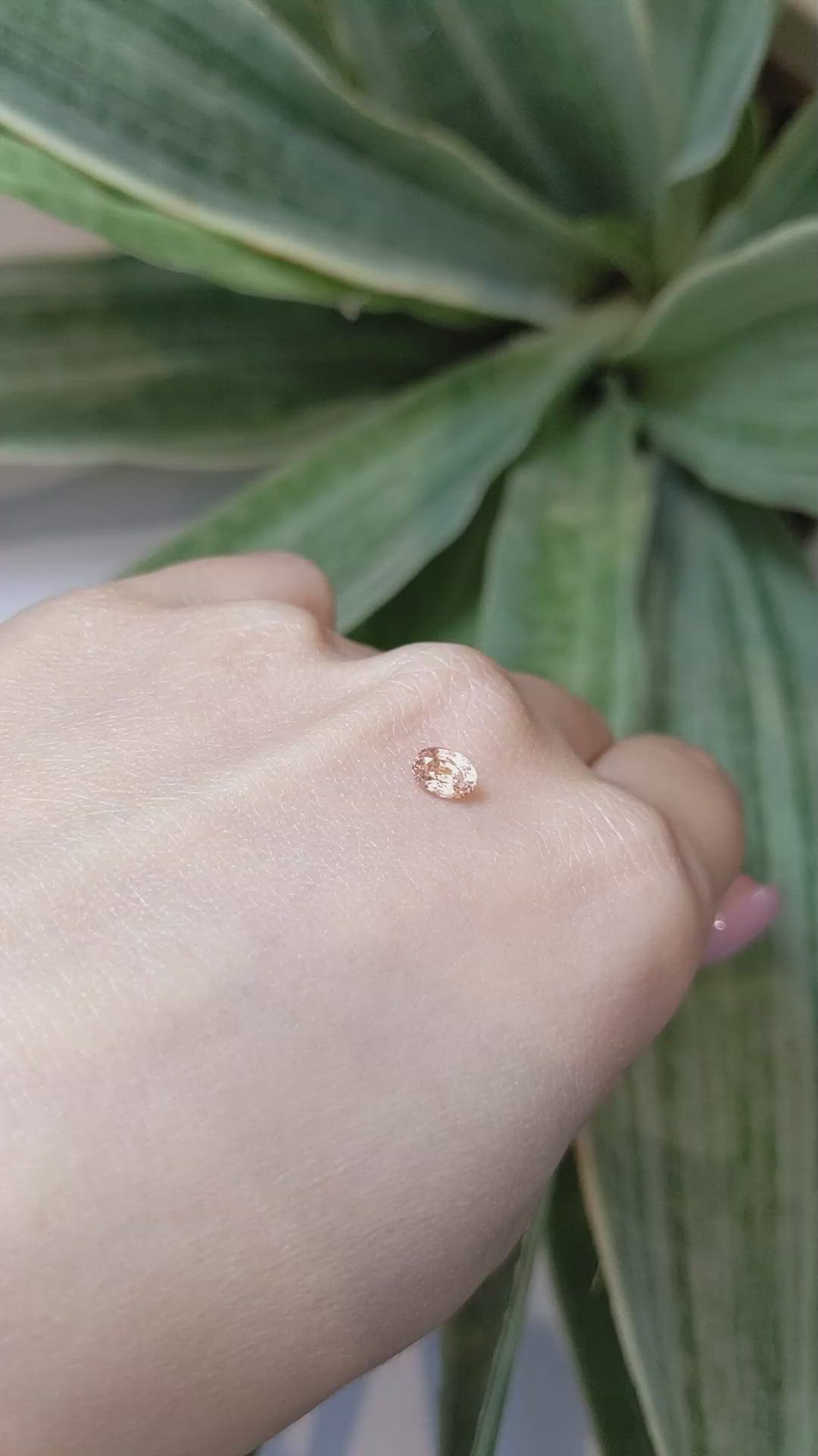 0.52 Ct. Peach Sapphire from Ceylon (Sri Lanka) Size Video