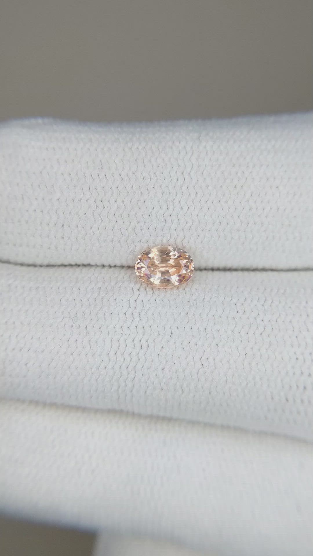 0.52 Ct. Peach Sapphire from Ceylon (Sri Lanka) Size Video