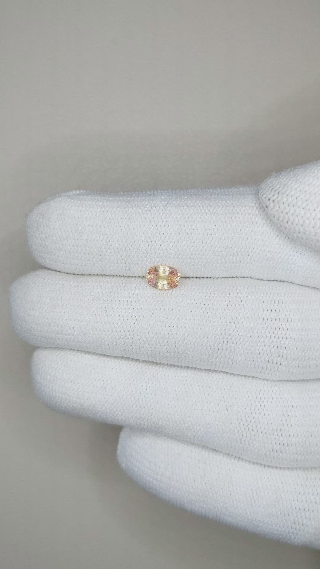 0.52 Ct. Peach Sapphire from Ceylon (Sri Lanka) Size Video