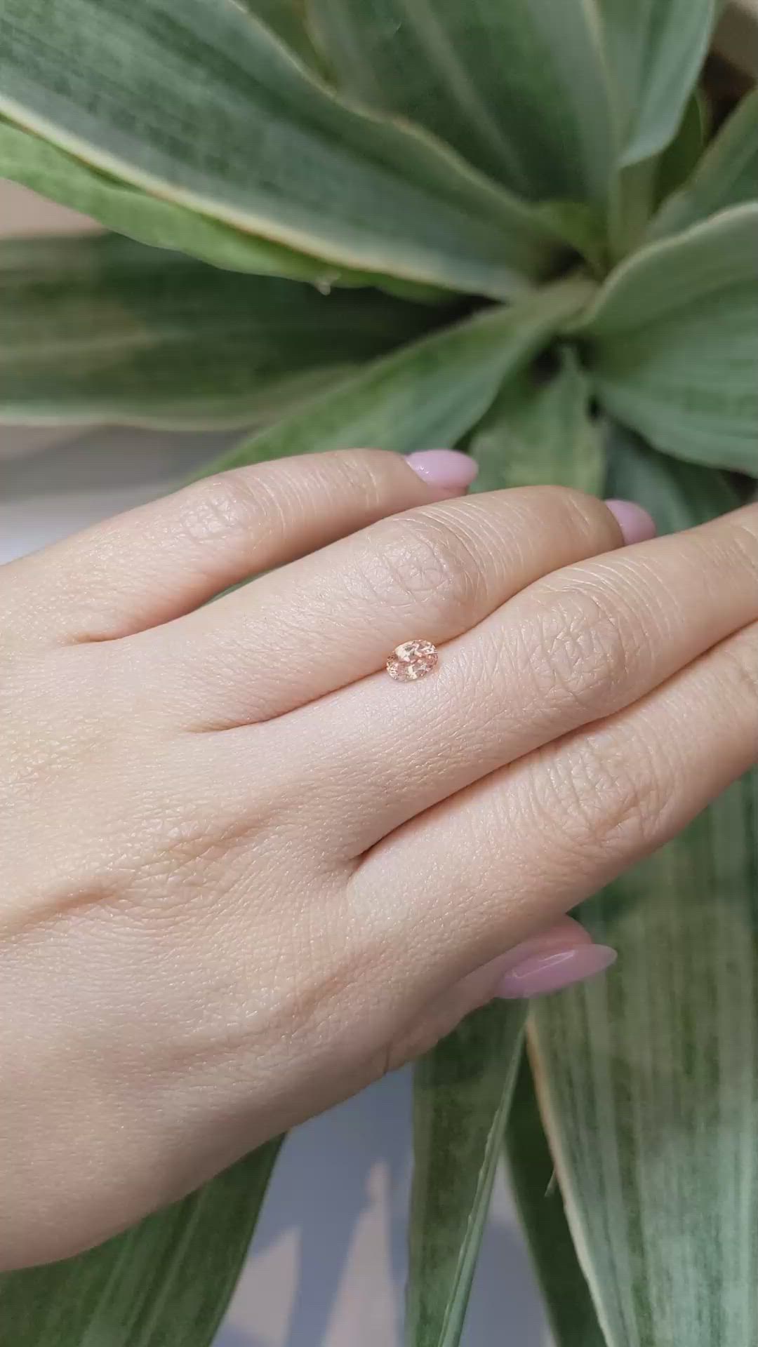 0.52 Ct. Peach Sapphire from Ceylon (Sri Lanka) Size Video