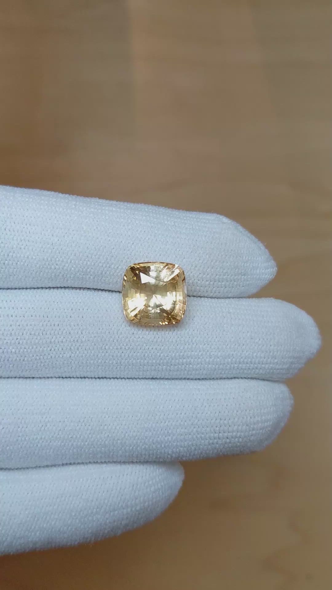 7.95 Ct. Orangish Yellow Sapphire from Ceylon (Sri Lanka) Size Video