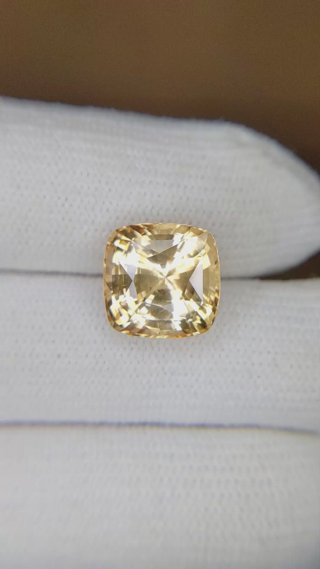 7.95 Ct. Orangish Yellow Sapphire from Ceylon (Sri Lanka) Size Video