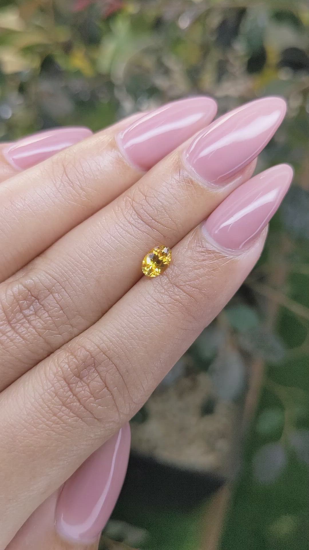 0.59 Ct. Orangish Yellow Sapphire from Ceylon (Sri Lanka) Size Video