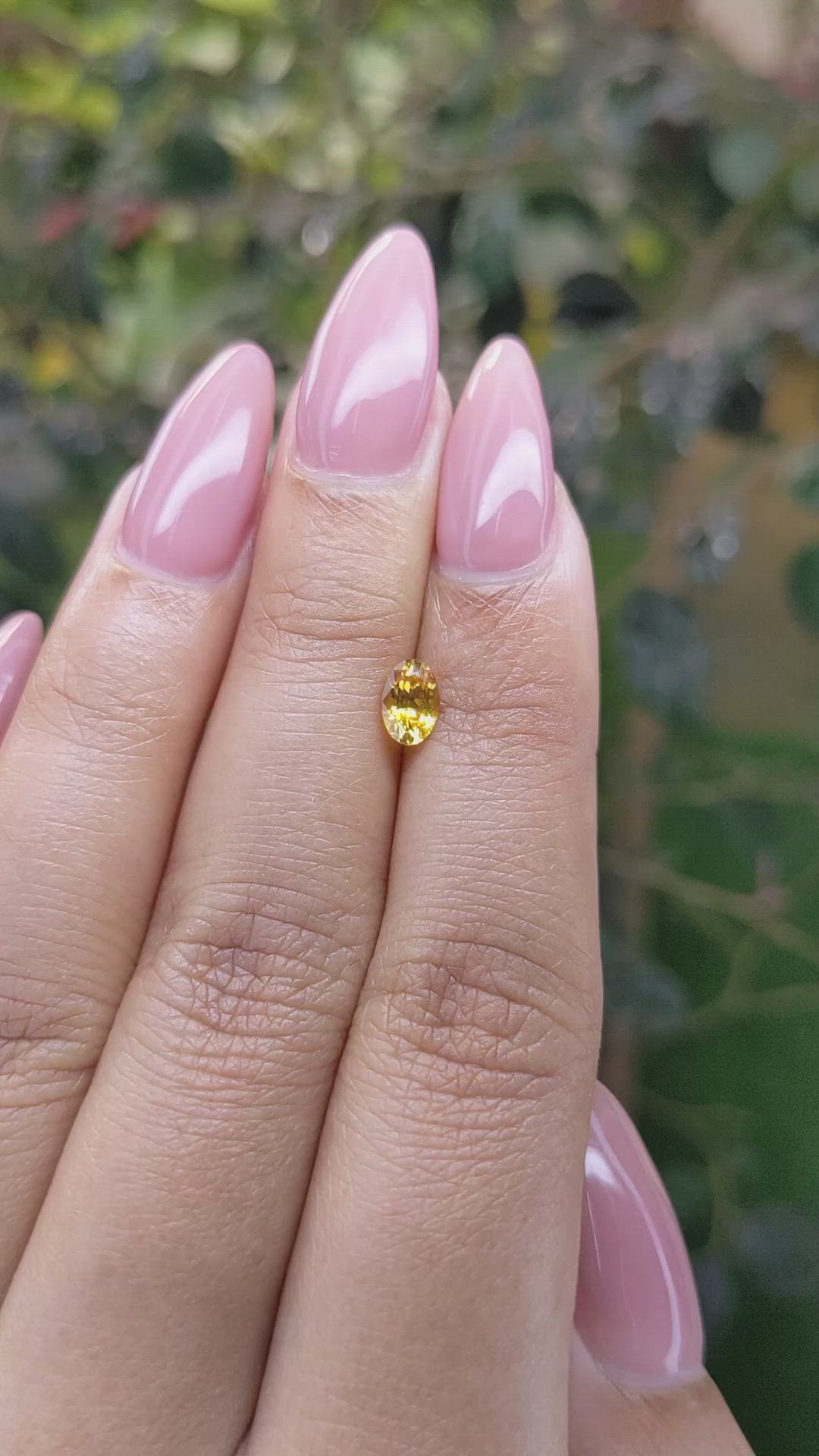 0.59 Ct. Orangish Yellow Sapphire from Ceylon (Sri Lanka) Size Video
