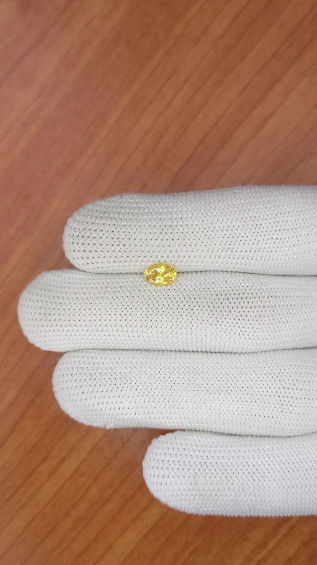 0.75 Ct. Orangish Yellow Sapphire from Ceylon (Sri Lanka) Size Video