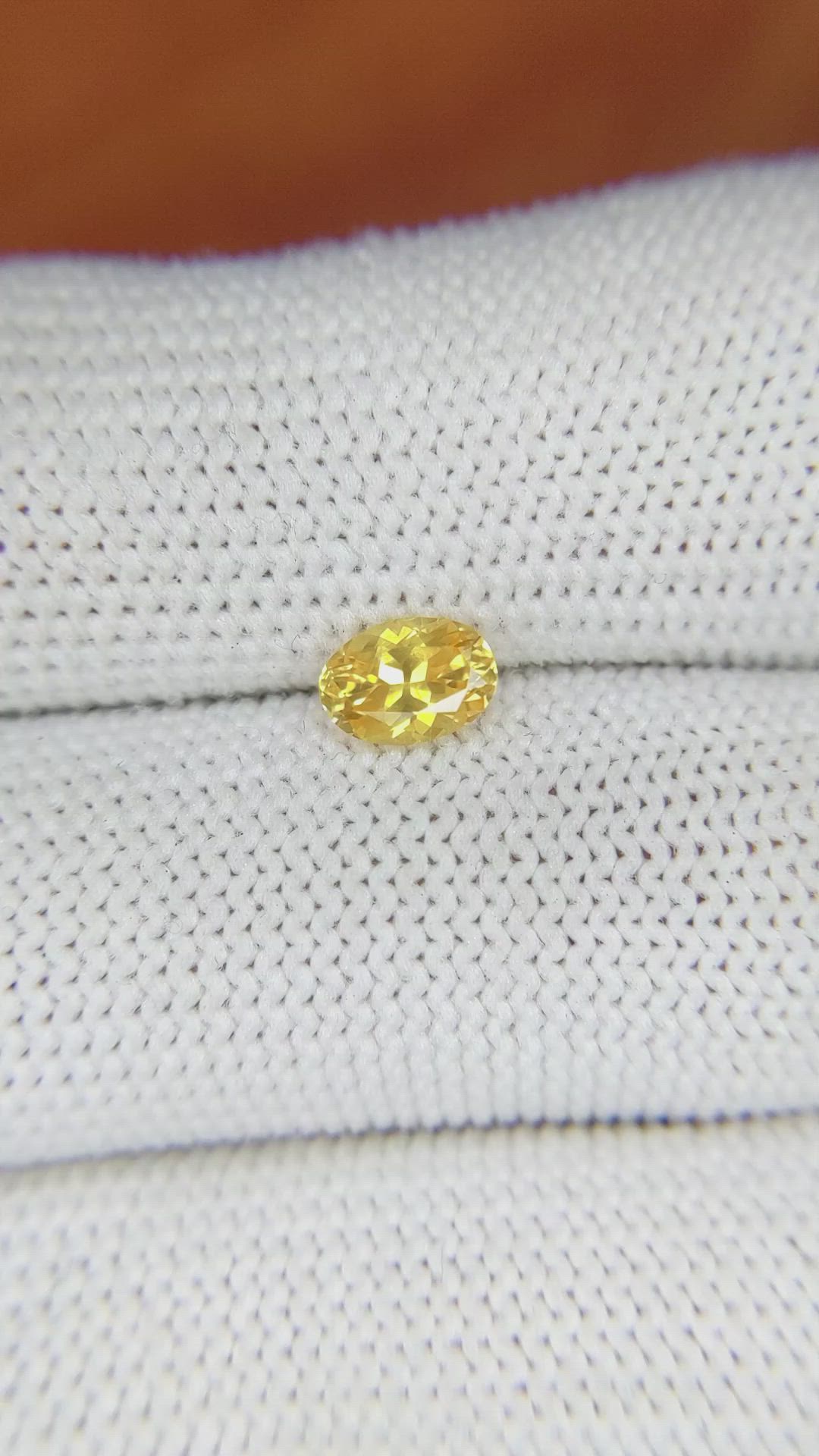 0.75 Ct. Orangish Yellow Sapphire from Ceylon (Sri Lanka) Size Video