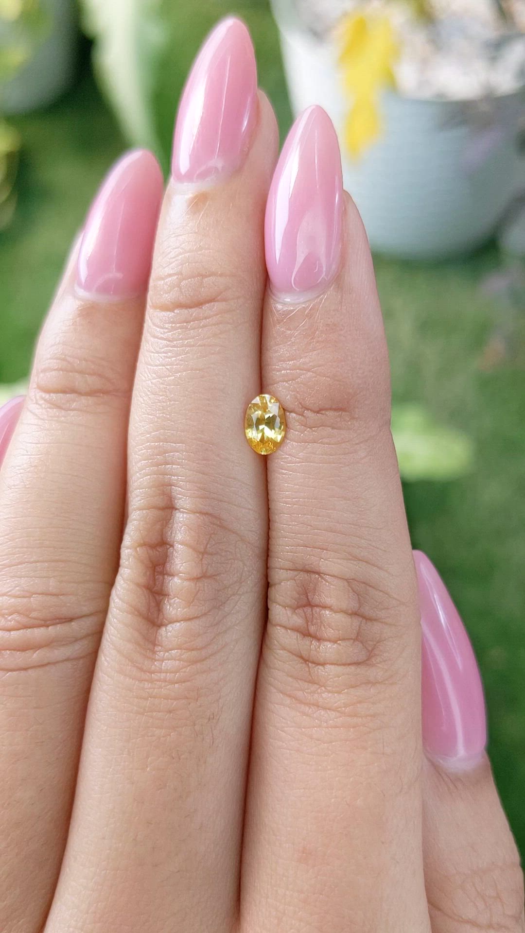 0.54 Ct. Orangish Yellow Sapphire from Ceylon (Sri Lanka) Size Video
