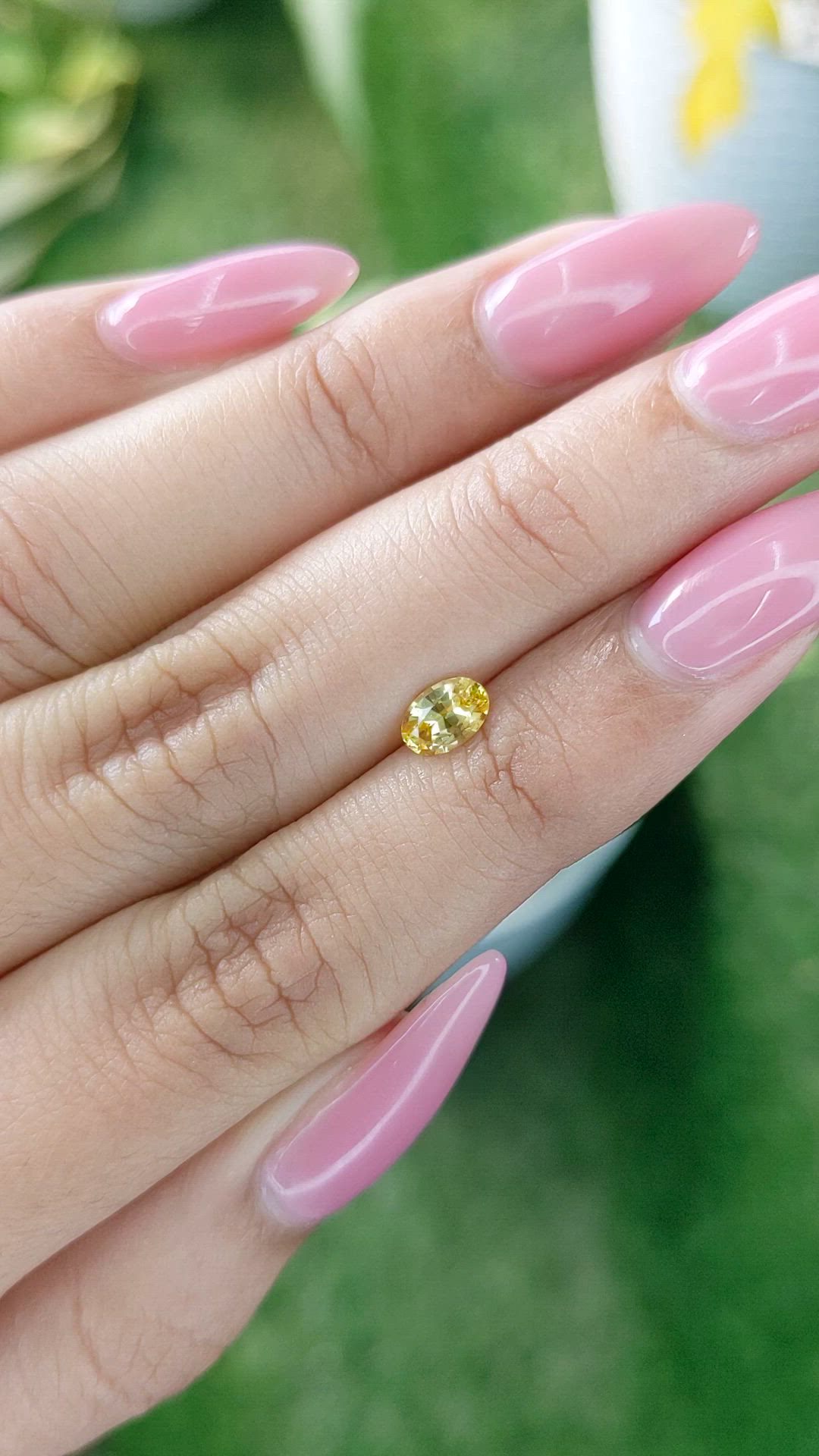 0.60 Ct. Orangish Yellow Sapphire from Ceylon (Sri Lanka) Size Video