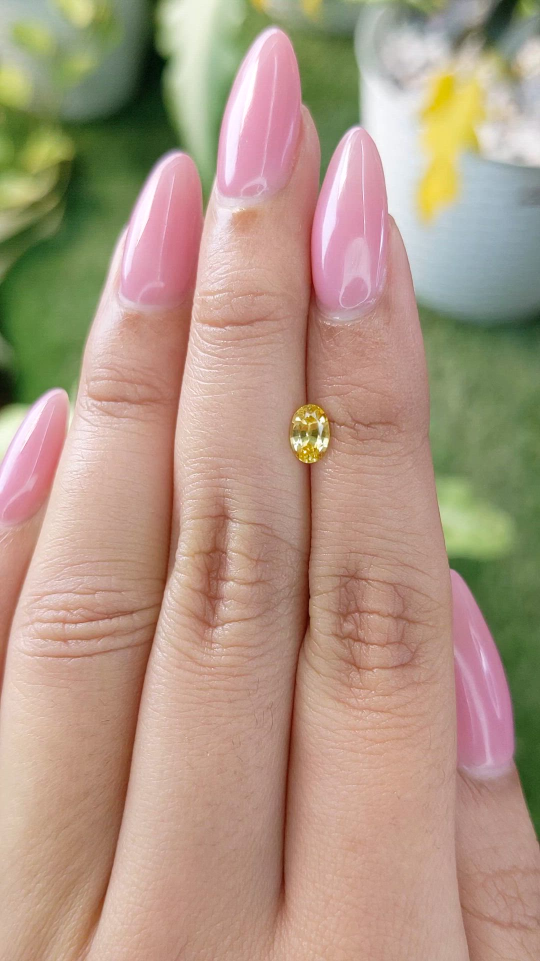 0.60 Ct. Orangish Yellow Sapphire from Ceylon (Sri Lanka) Size Video