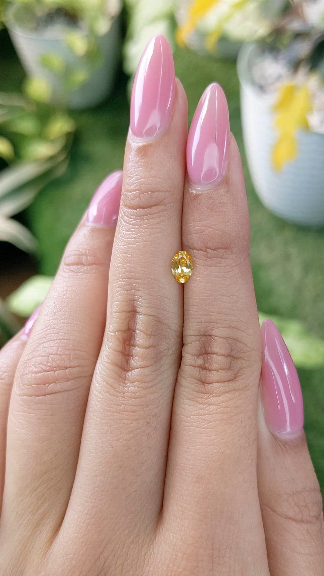 0.45 Ct. Orangish Yellow Sapphire from Ceylon (Sri Lanka) Size Video