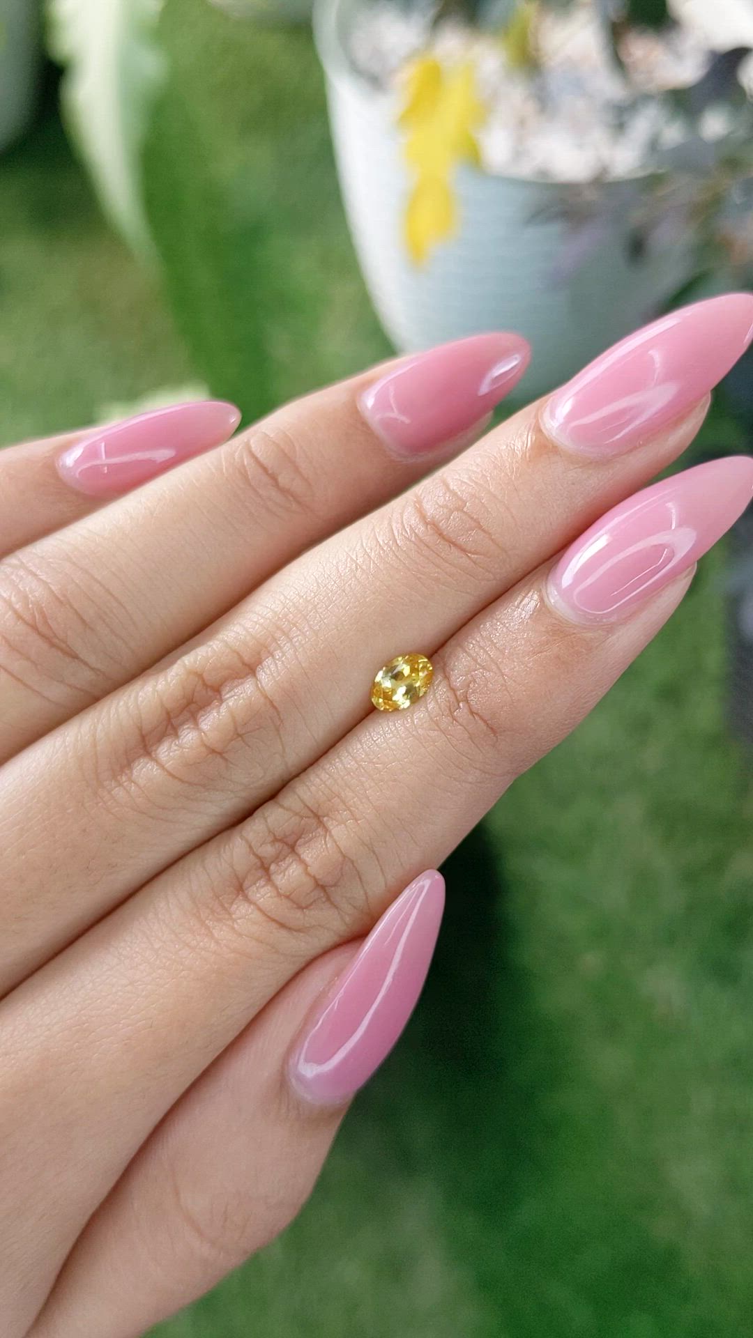 0.45 Ct. Orangish Yellow Sapphire from Ceylon (Sri Lanka) Size Video