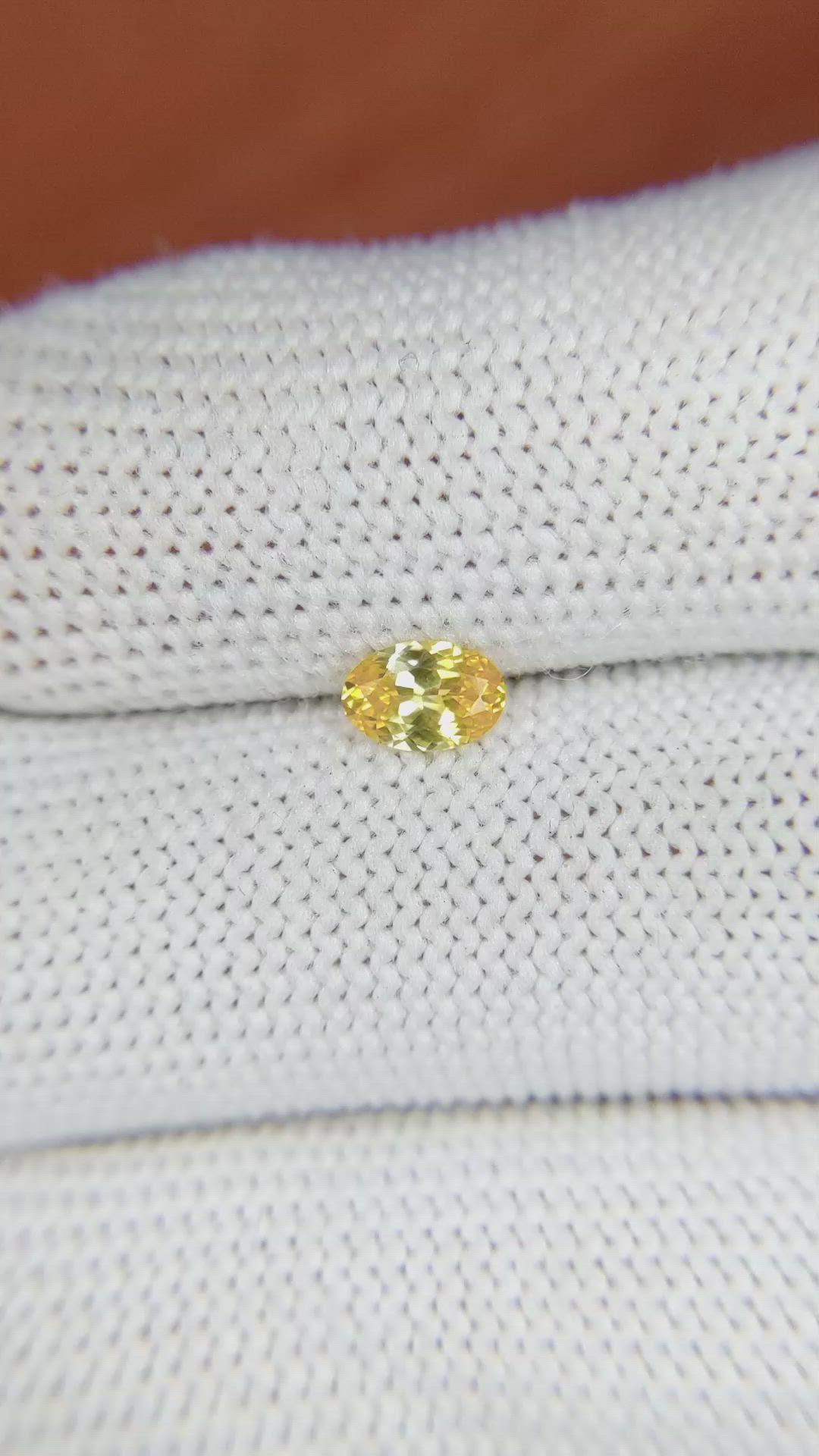 0.45 Ct. Orangish Yellow Sapphire from Ceylon (Sri Lanka) Size Video