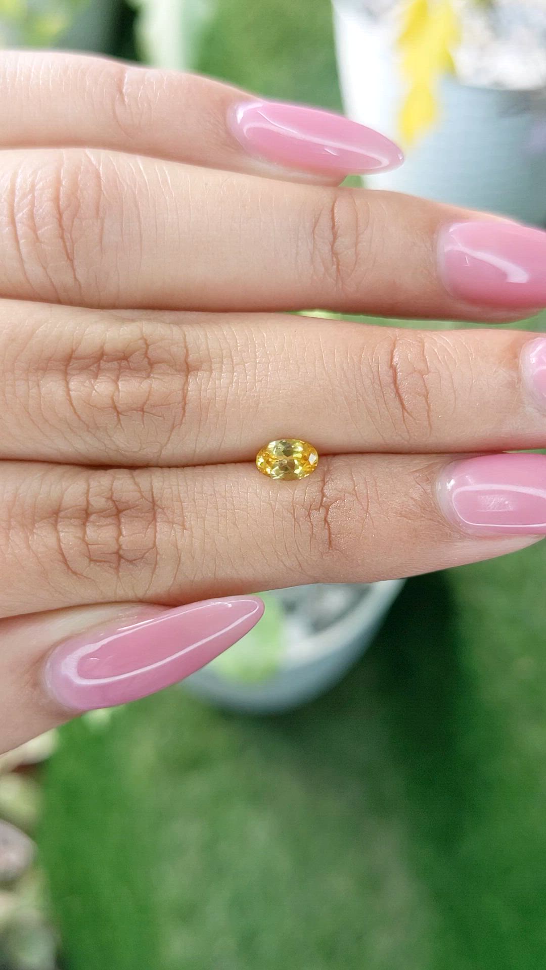 0.45 Ct. Orangish Yellow Sapphire from Ceylon (Sri Lanka) Size Video